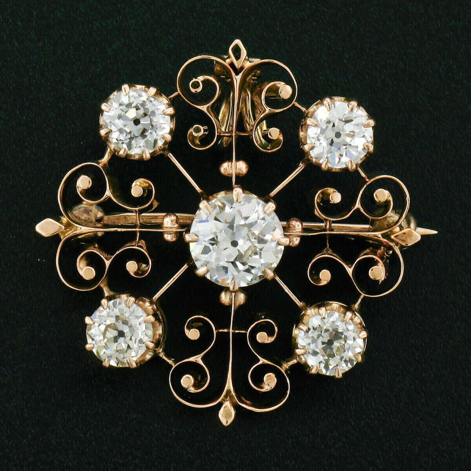 Here we have a stunning antique brooch or pendant which was crafted in solid 14k yellow gold during the Victorian period. It features a gorgeous, approximately 1.0 carat, super fine quality old European cut diamond prong set at its center. The