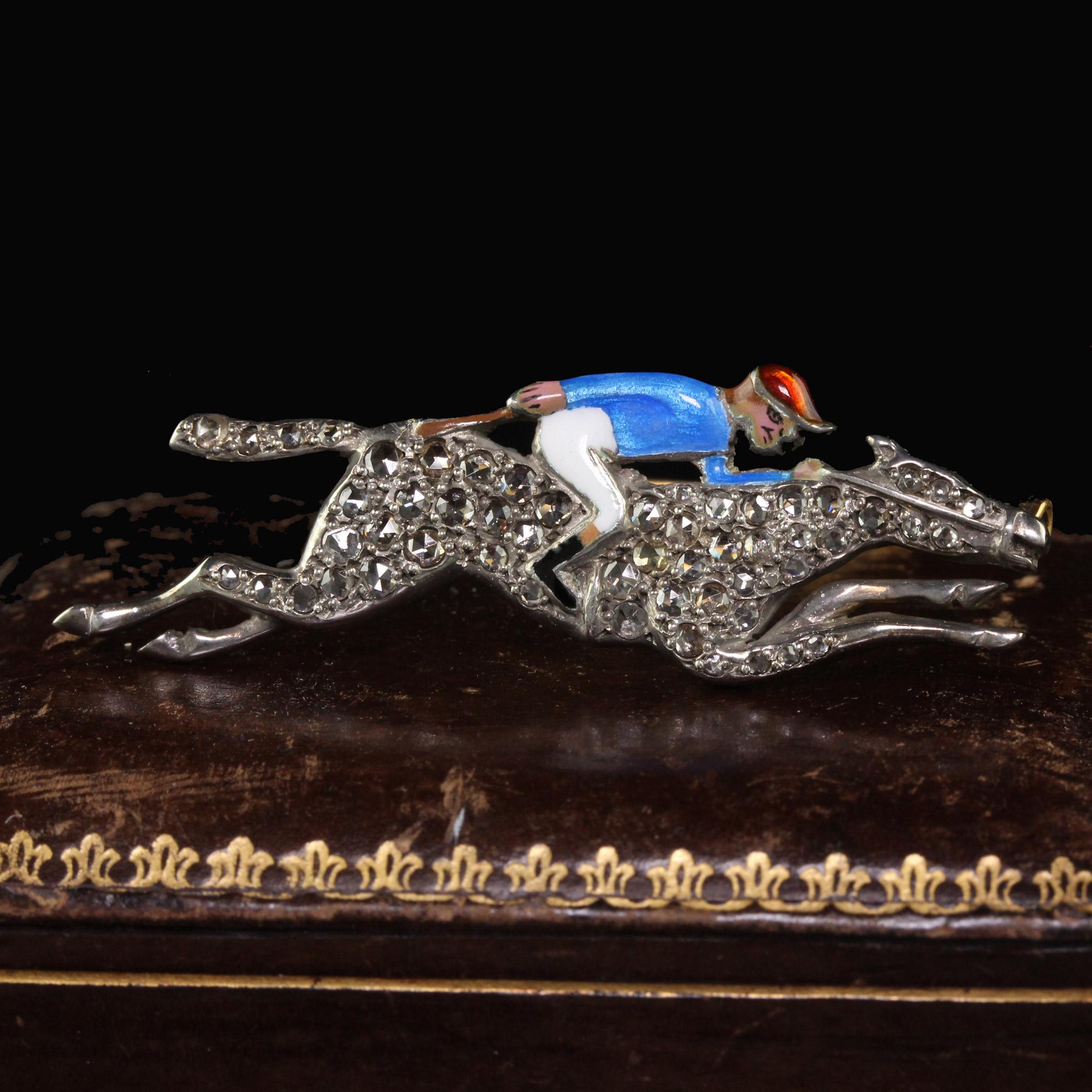 Beautiful Antique Victorian 14K Gold and Silver Rose Cut Diamond Horse Jockey Enamel Pin. This gorgeous antique Victorian jockey pin is crafted in 14k yellow gold and silver. The pin features a horse jockey that has enamel on it on a horse that has