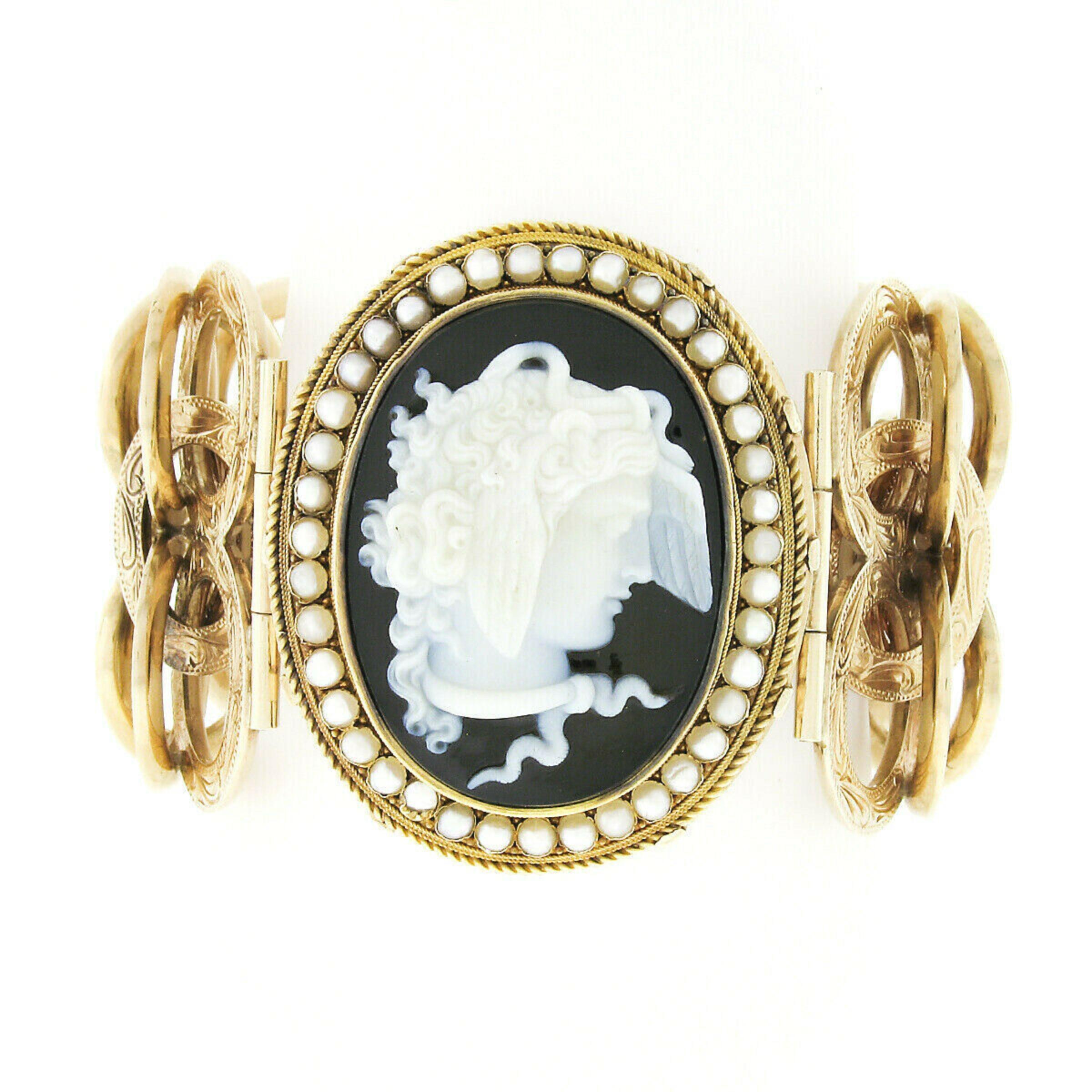 This incredibly designed antique statement piece was crafted in solid 14k gold during the Victorian era. The bracelet features a large center section that carries an amazing and well carved black onyx cameo showing a portrait with fascinating