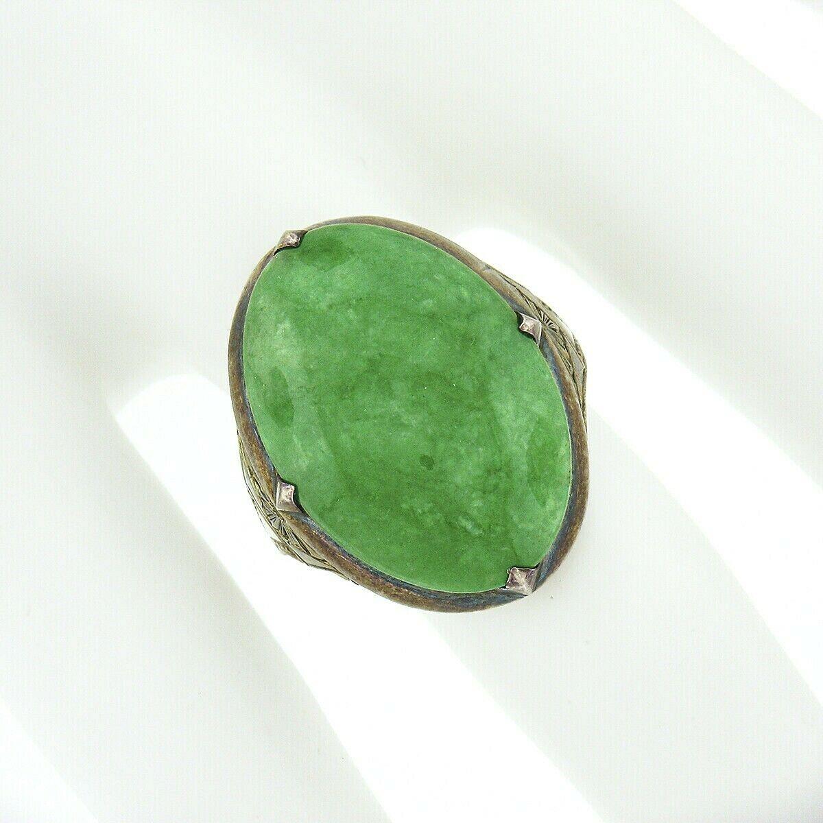 Antique Victorian 14k Gold Large GIA Oval Cabochon Jade Hand Engraved Sides Ring In Good Condition In Montclair, NJ