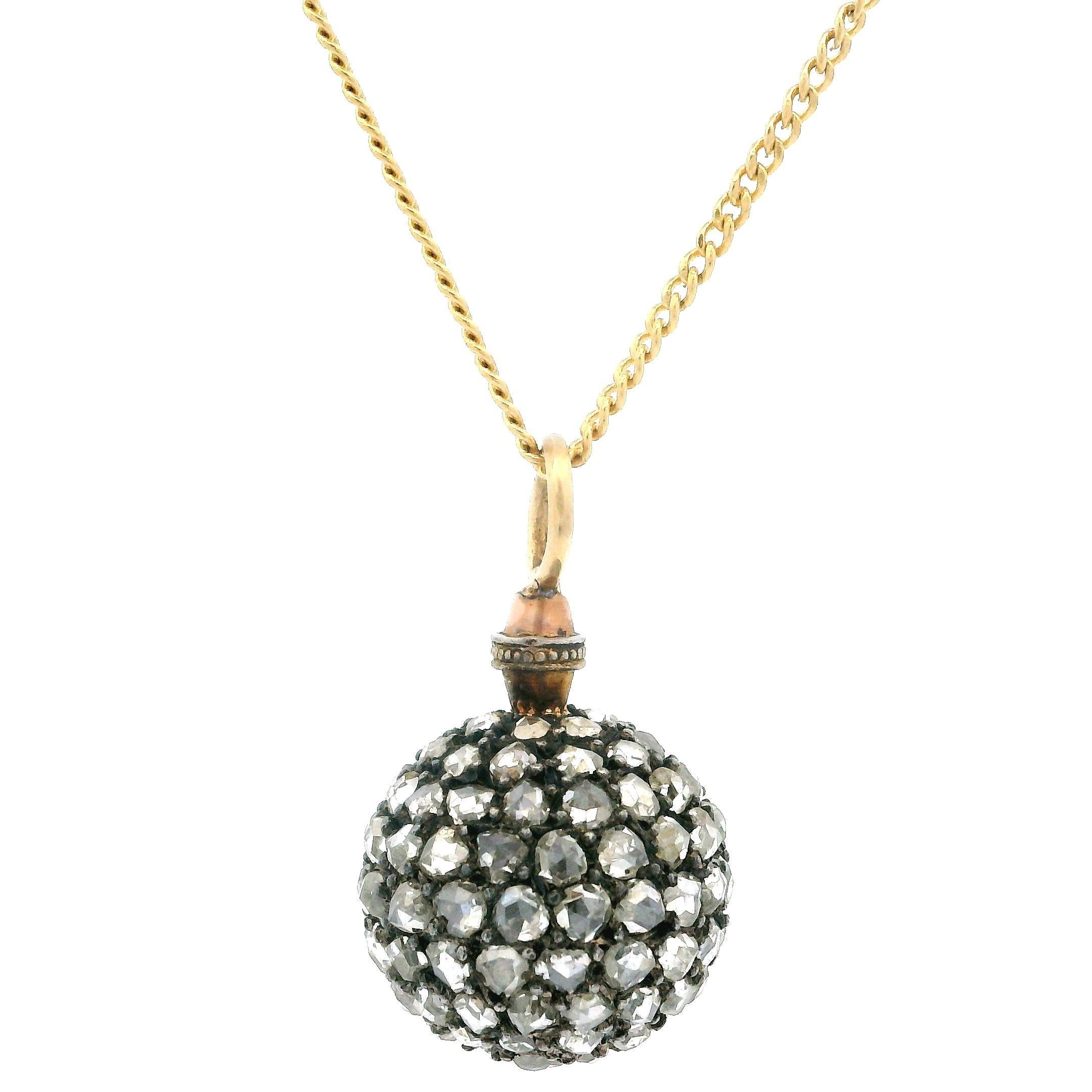 --Stone(s):--
Numerous Natural Genuine Diamonds - Old Rose Cut - Pave Set - Fiery nice diamonds - 1.50-2.0ctw (approx.)

Material: Solid 13-14k Yellow Gold Chain & Bail, Diamond Set in Silver
Weight: 7.20 Grams
Overall Width/Thickness: 14.3mm