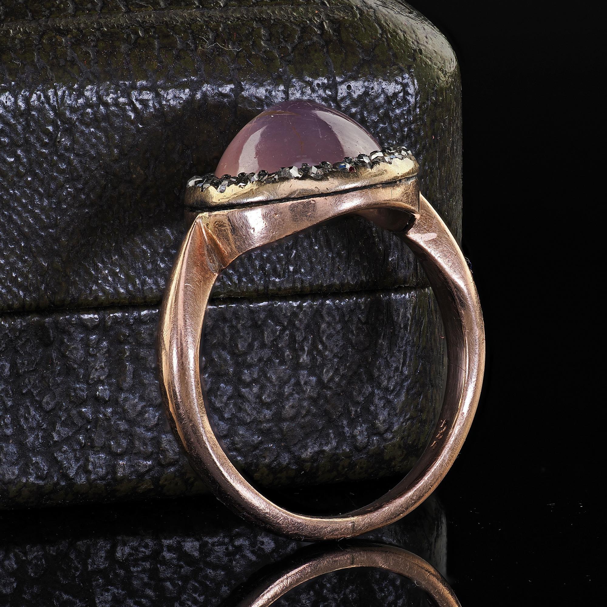 Antique Victorian 14K Rose Gold Cabochon Star Sapphire and Diamond Halo Ring In Good Condition For Sale In Great Neck, NY