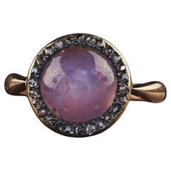 Antique Victorian 14K Rose Gold Cabochon Star Sapphire and Diamond Halo Ring