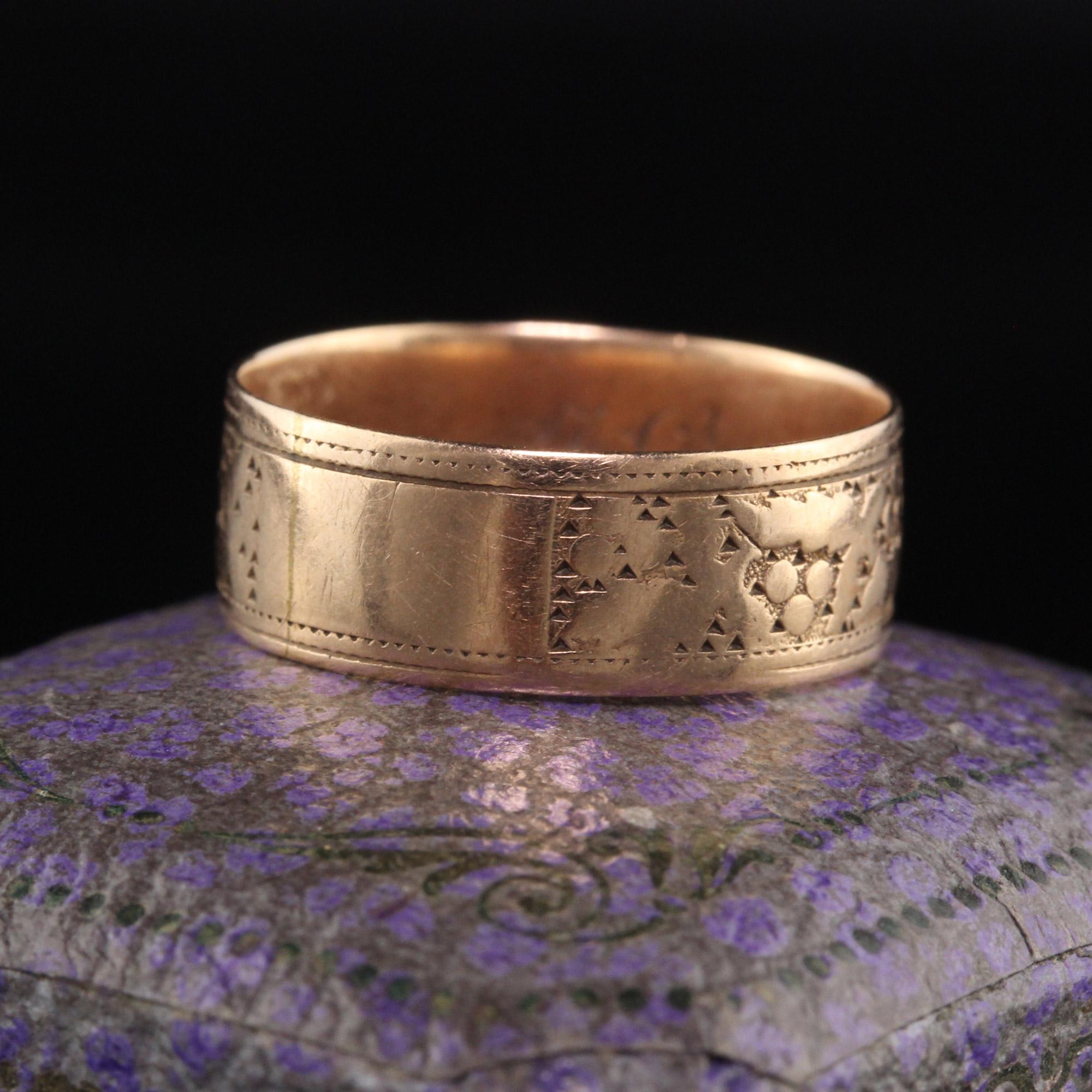 Beautiful Antique Victorian 14K Rose Gold Engraved Wide Wedding Band. This beautiful wedding band is crafted in 14K rose gold and has an interesting engraved design going around the entire ring.

Item #R1190

Metal: 14K Rose Gold

Weight: 2.5