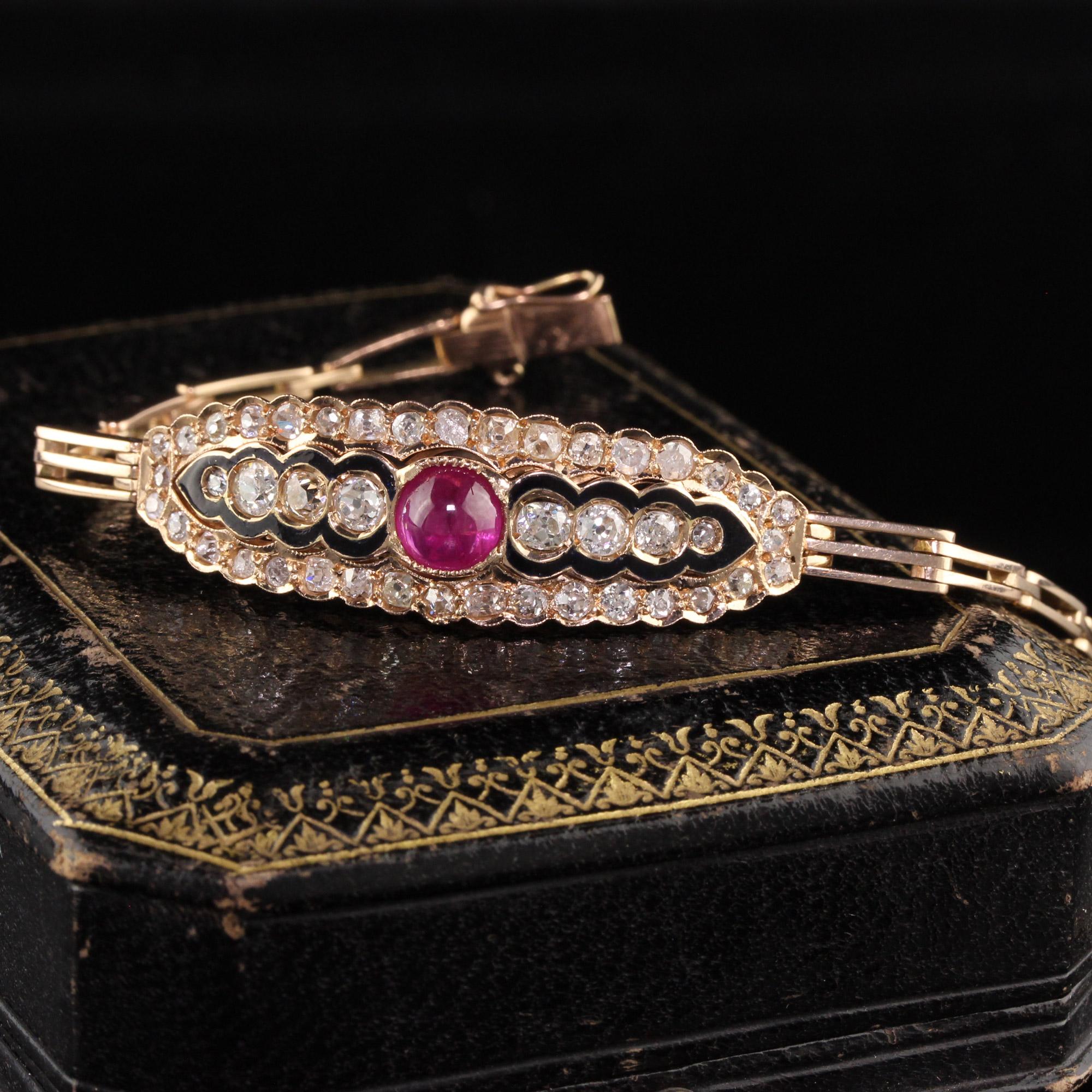 Beautiful Antique Victorian 14K Rose Gold Old Mine Diamond and Cabochon Ruby Bracelet. This gorgeous bracelet is crafted in 14k rose gold. The bracelet features old mine cut diamonds and a natural cabochon ruby set in a gorgeous enamel Victorian