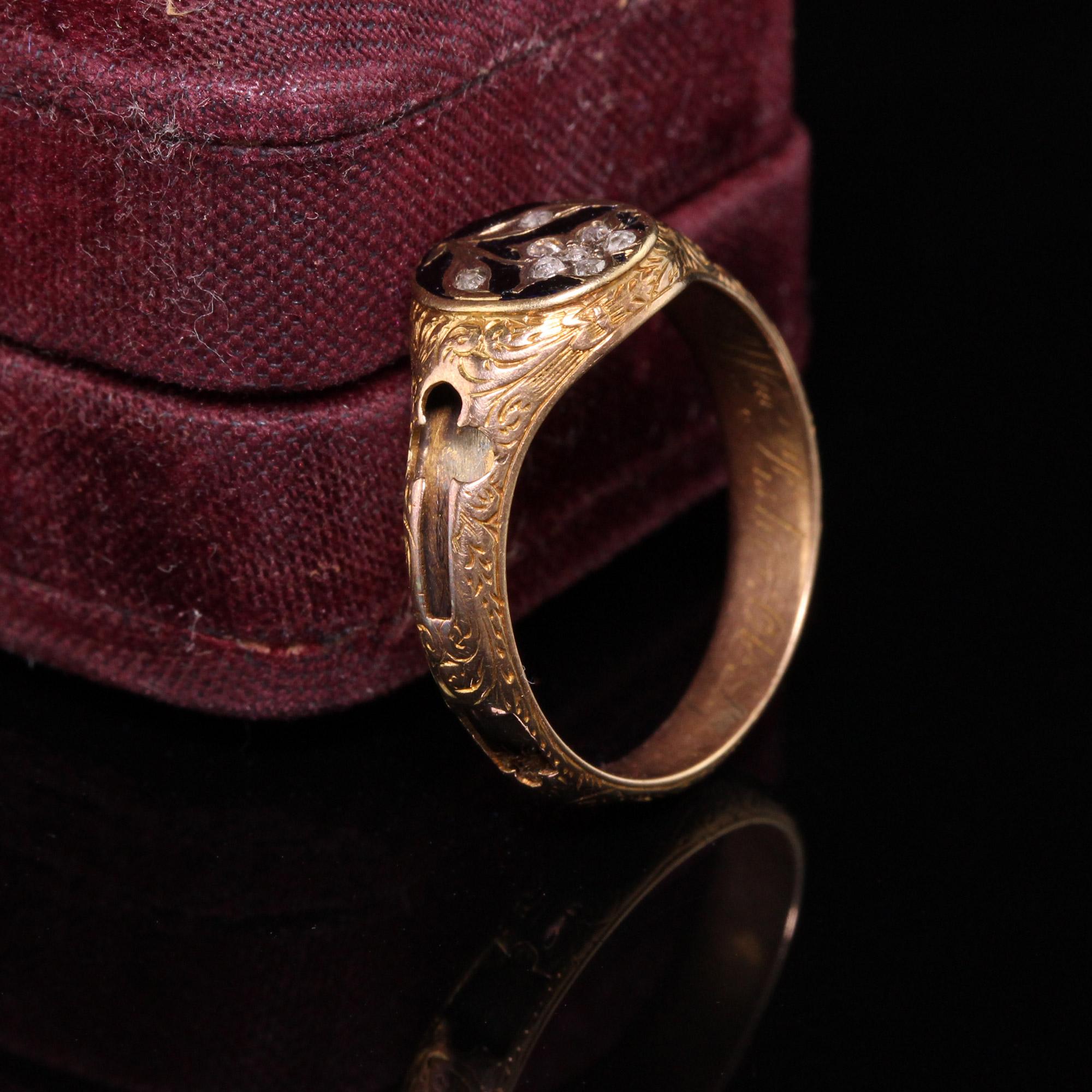 Beautiful Antique Victorian 14K Rose Gold Rose Cut Engraved Enamel Mourning Ring. This amazing ring has engraving all around the ring with a faded engraving inside the shank that we can't make out. The enamel is slightly worn and the hair or fabric