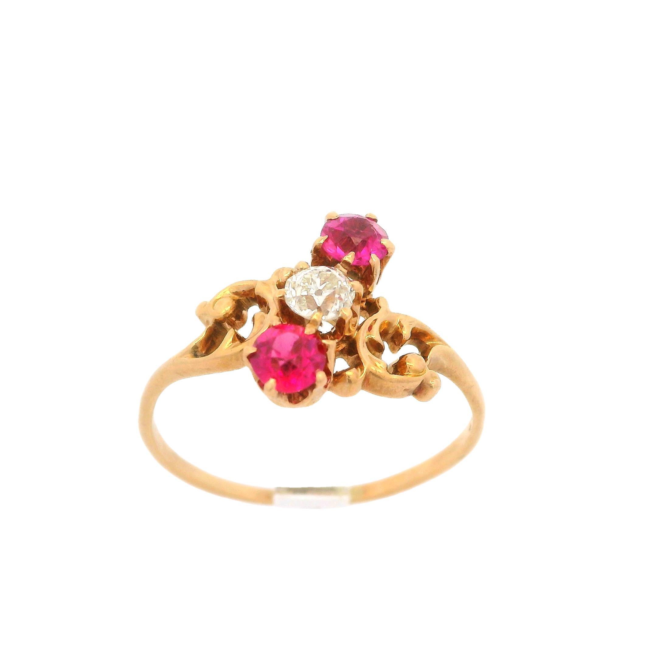 --Stone(s):--
(1) Natural Genuine Diamonds -Old Mine Cut - Prong Set - White Color - 3.65mm (approx.) - 0.20ctw (approx.)
(2) Red Stones -Old Mine Cut - Prong Set - Pinkish Red Color - 3.75mm (approx.) 

Material: 14k rosy Yellow Gold
Weight: 2.24