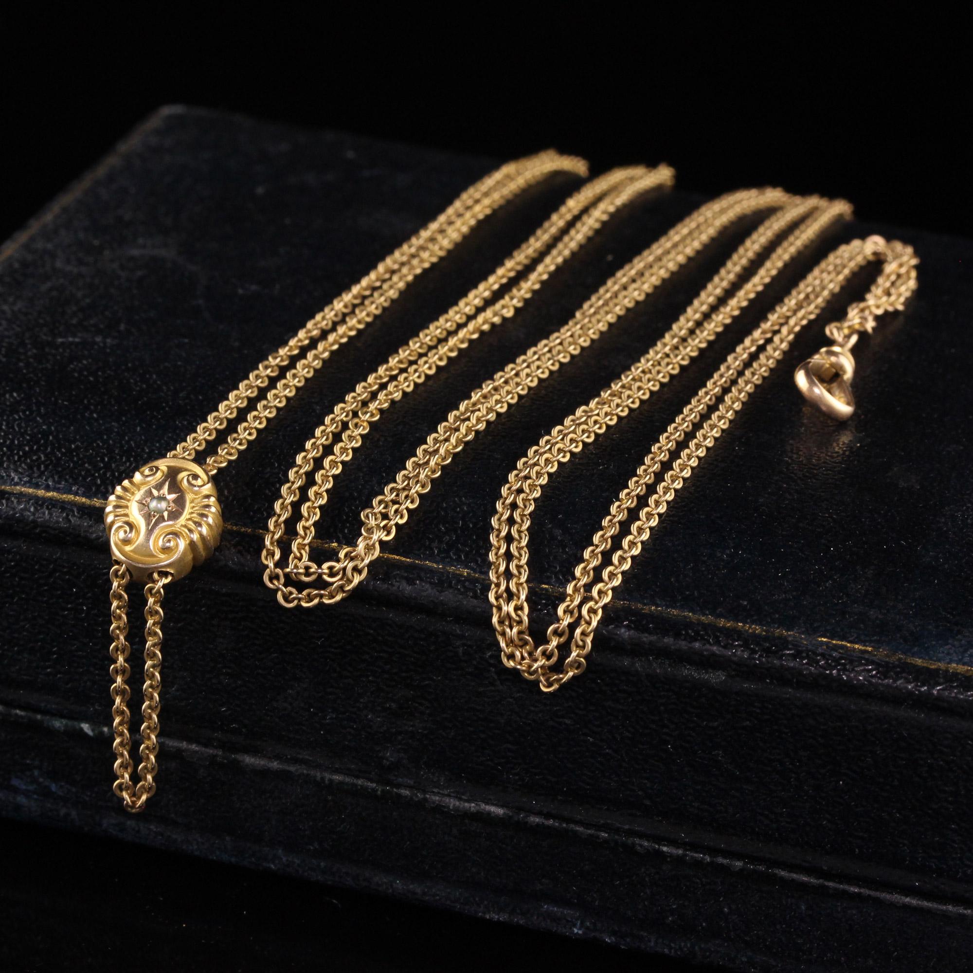 Beautiful Antique Victorian 14K Yellow Gold Cable Link Chain Slider Necklace - 50 inches. This classic chain necklace is crafted in 14k yellow gold. The chain is made with a cable link and has a beautiful slider in the middle that can be adjusted