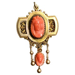 Antiguo colgante victoriano de oro amarillo de 14 quilates con doble camafeo de coral