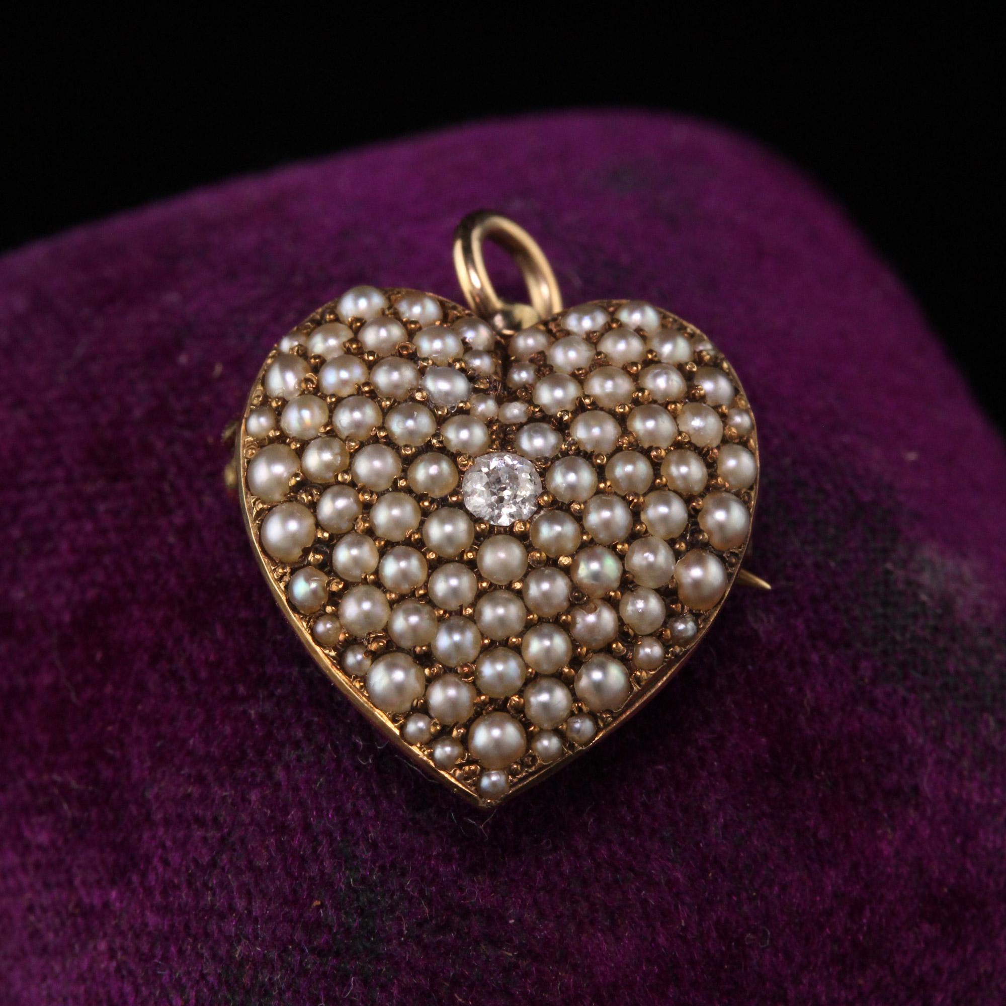 Beautiful Antique Victorian 14K Yellow Gold Diamond and Natural Pearl Heart Pendant Pin. This amazing piece can be worn as a pin or a pendant. The item is in amazing condition and just a wonderful piece to own.

Item #P0111

Metal: 14K Yellow