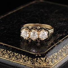 Antique Victorian 14 Karat Yellow Gold Diamond and Black Enamel 3-Stone Ring