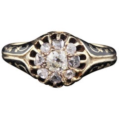 Antique Victorian 14 Karat Yellow Gold Diamond and Black Enamel Cluster Ring