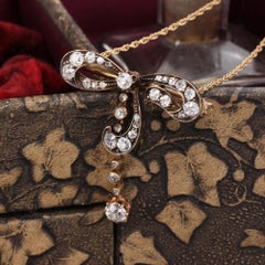 Antique Victorian 14 Karat Yellow Gold Diamond Bow Convertible Pendant and Pin