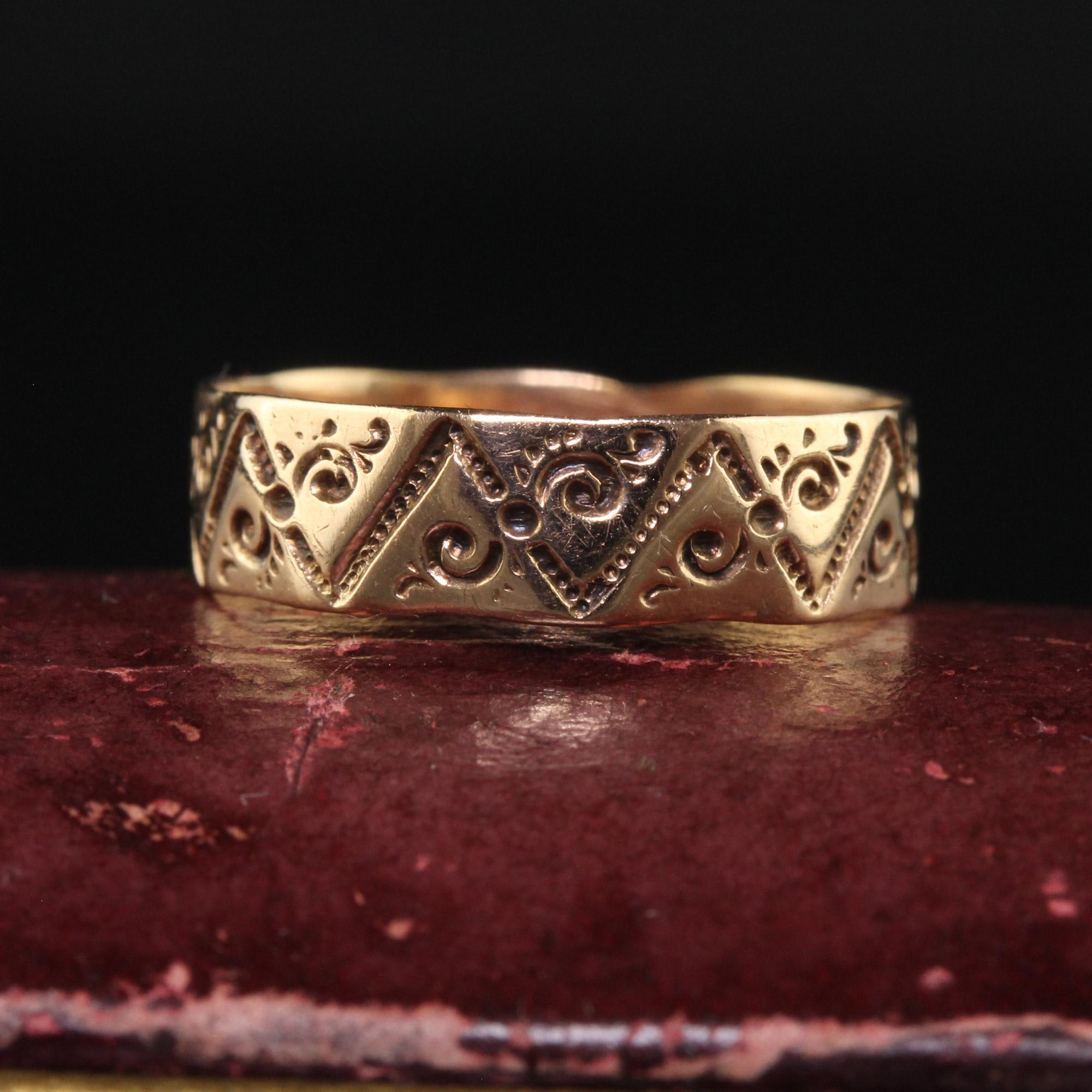 Beautiful Antique Victorian 14K Yellow Gold Engraved Wedding Band - Size 5 1/2. This unique Victorian wedding band is crafted in 14k yellow gold. This band features gorgeous engravings around the entire ring and is in good condition. The ring is low