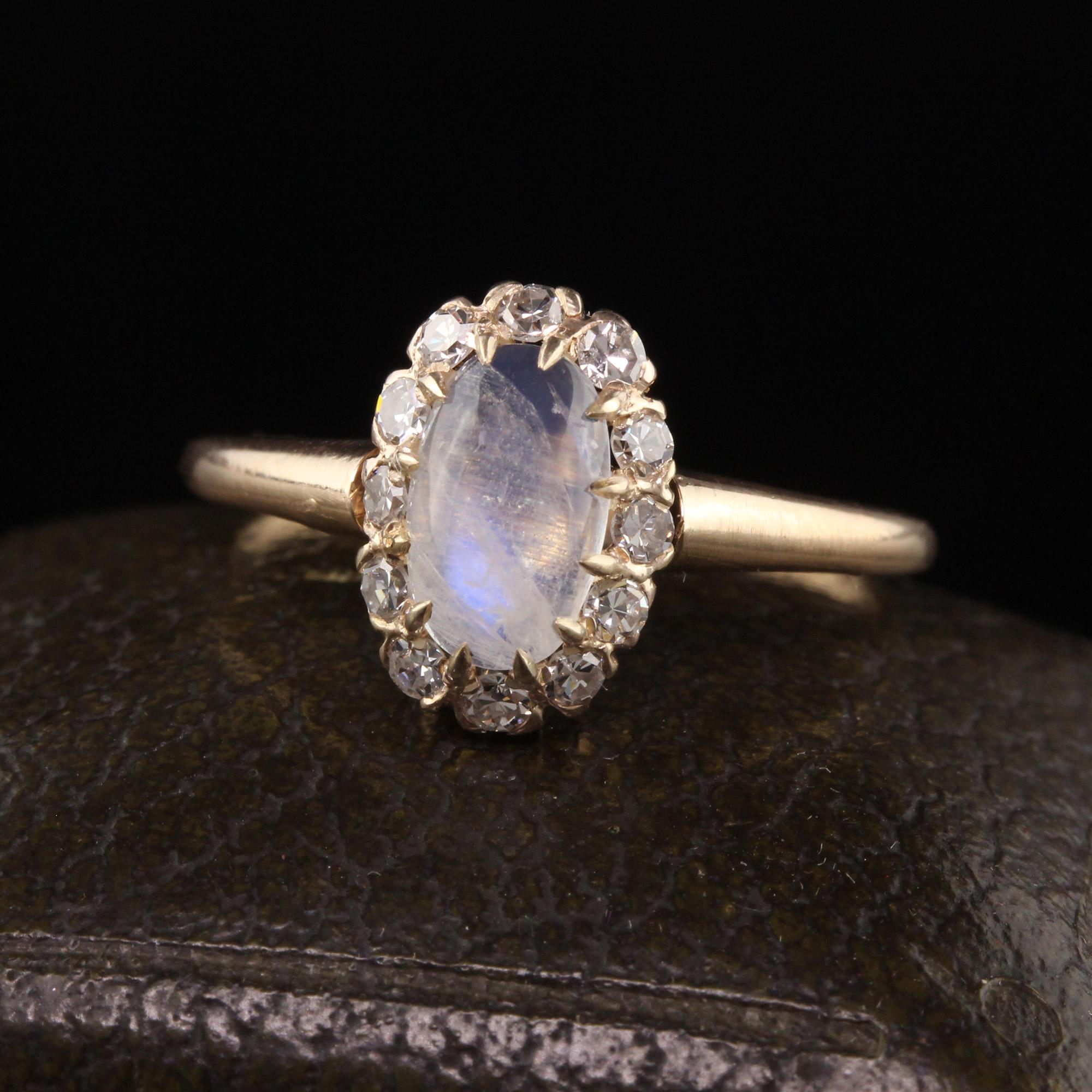Beautiful Antique Victorian 14K Yellow Gold Moonstone Old European Diamond Ring. This beautiful ring is crafted in 14k yellow gold. The center holds a rainbow moonstone surrounded by old european cut diamonds.

Item #R1347

Metal: 14K Yellow