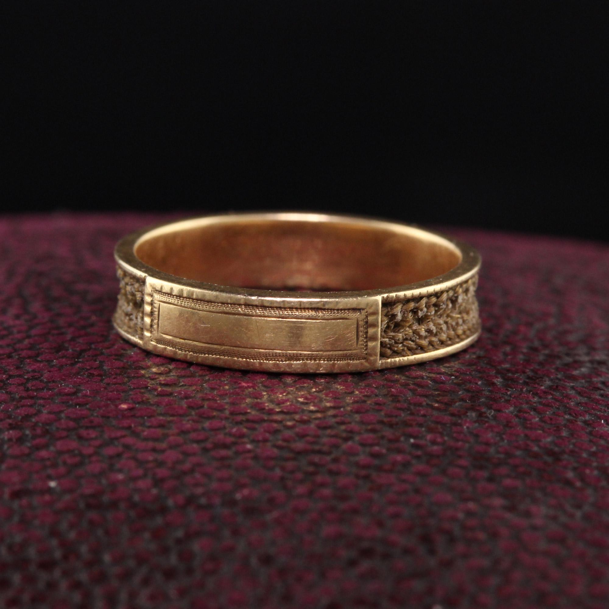 Beautiful Antique Victorian 14K Yellow Gold Mourning Hair Band Ring. This amazing mourning ring still has the hair intact and is not engraved with any initials! It is very rare to come across non initialed rings of this age.

Item #R0966

Metal: 14K