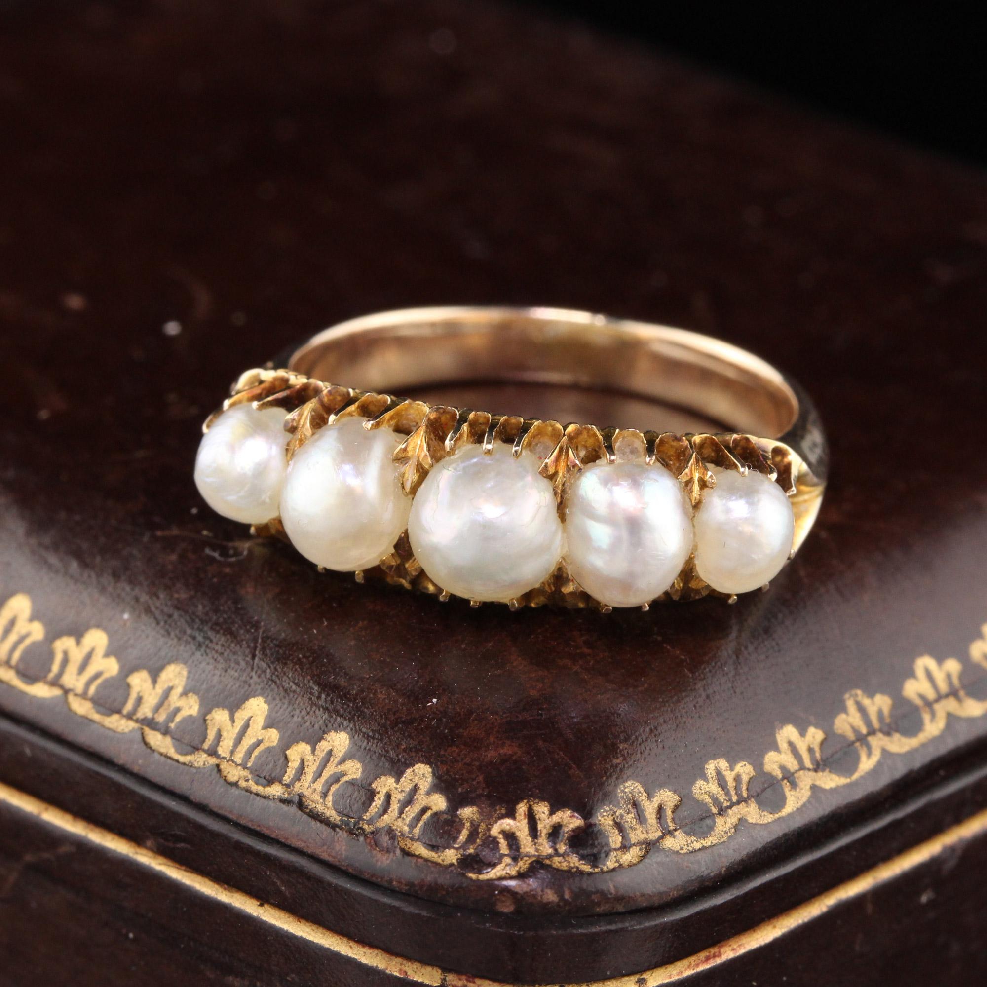Gorgeous classic Victorian Natural Pearl Half Hoop Ring set in yellow gold.

#R0266

Metal: 14K Yellow Gold 

Weight: 4 Grams

Ring Size: 6 3/4 (sizable)

This ring can be sized for a $30 fee!

*Please note that we cannot accept returns on sized