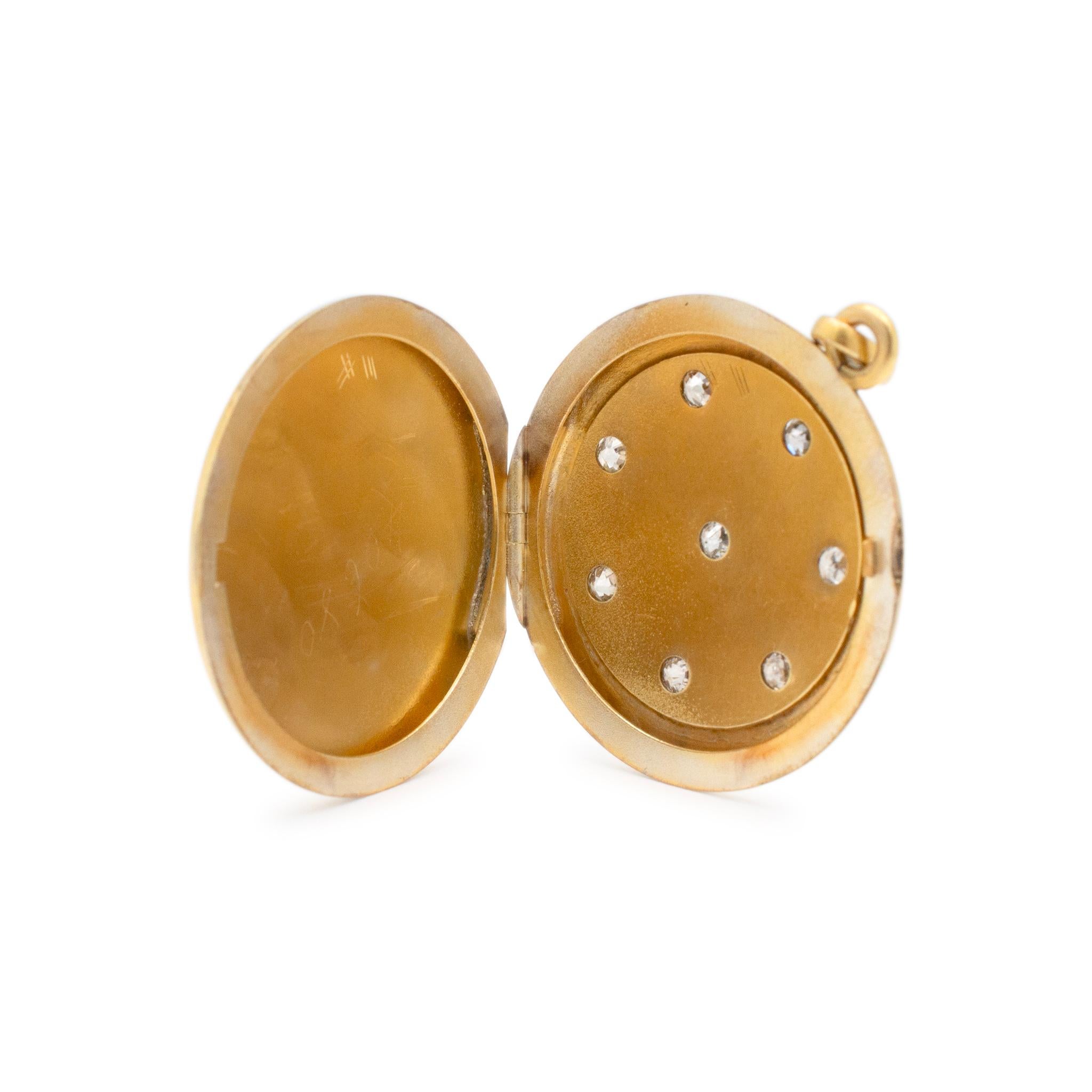 Metal Type: 14K Yellow Gold

Gender: Ladies

Thickness: 6.00 mm

Diameter: 1.25 inches

Weight: 12.29 grams

Ladies 14K yellow gold diamond victorian (1837-1901) circle locket pendant. The metal was tested and determined to be 14K yellow gold. In