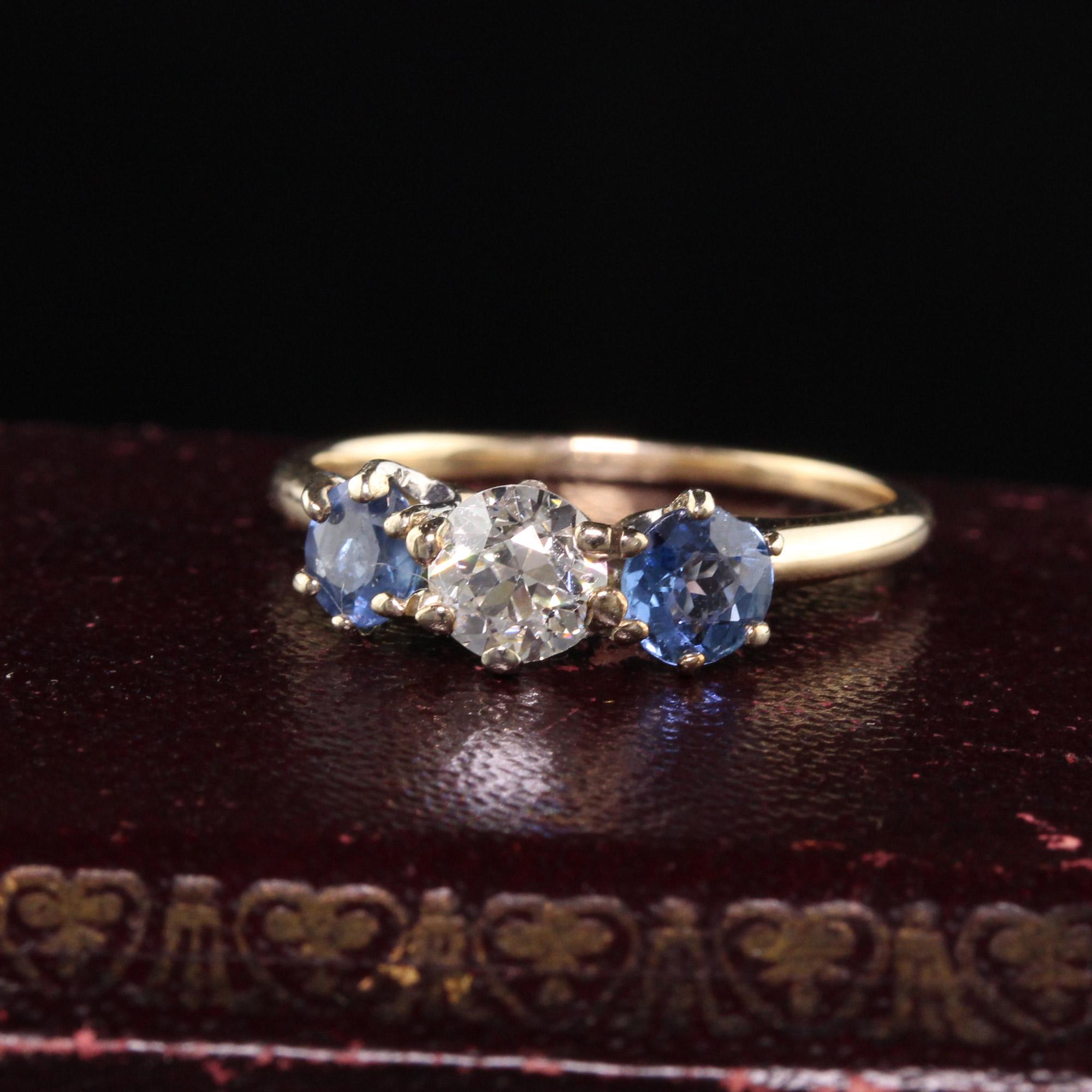 Beautiful Antique Victorian 14K Yellow Gold Old European Diamond Sapphire Three Stone Ring. This amazing three stone ring has two blue sapphires on the sides with an old european cut diamond in the center.

Item #R0988

Metal: 14K Yellow