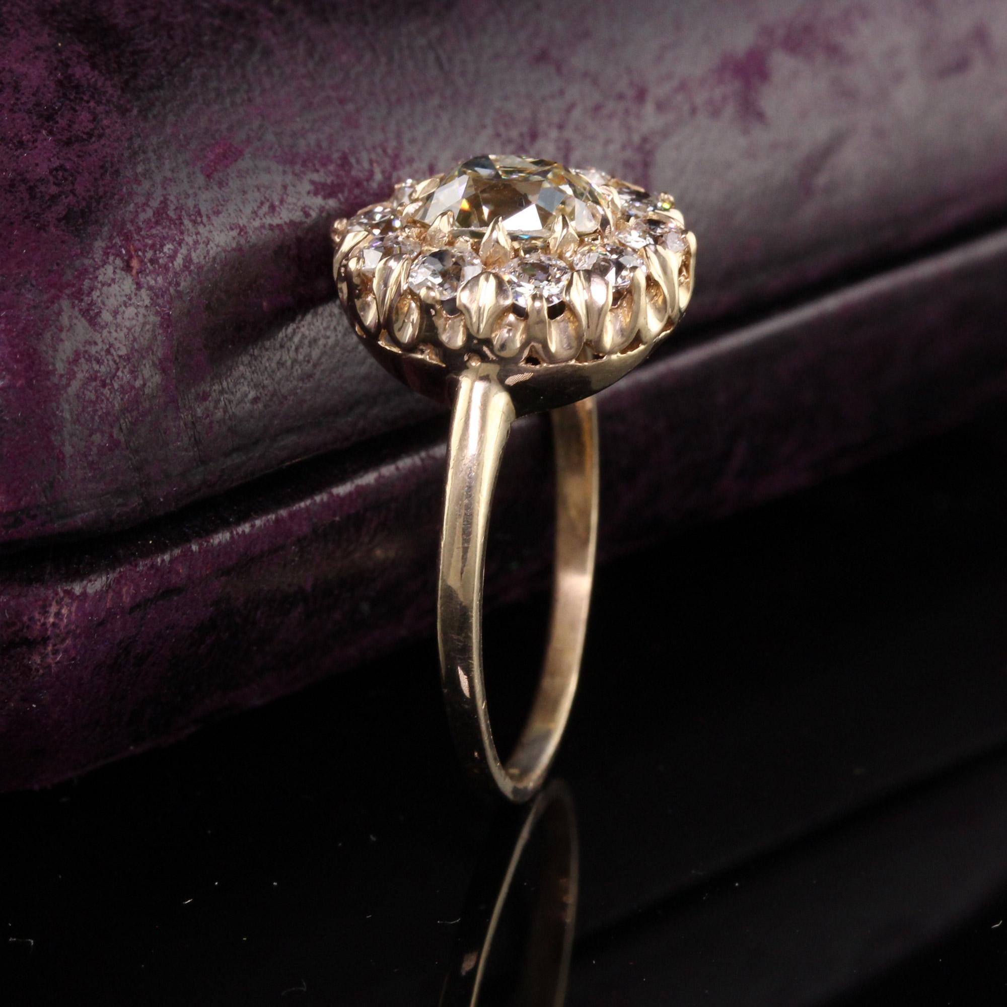Beautiful Antique Victorian 14K Yellow Gold Old Mine Cushion Cut Diamond Engagement Ring. This stunning engagement ring features a beautiful long old mine cushion cut diamond in the center surrounded by old european cut diamonds going around