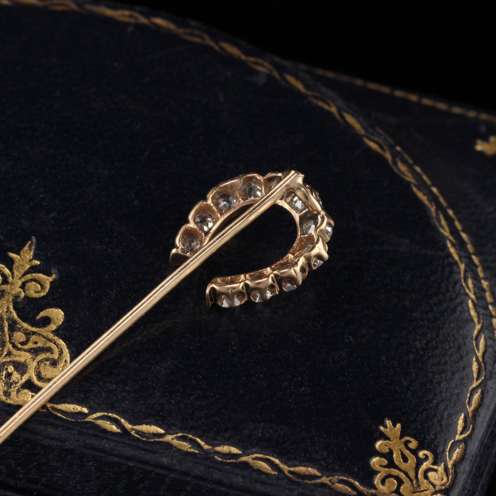 Stunning Victorian horse shoe pin with Old mine cut diamonds. 

Item #P0094

Metal: 14K Yellow Gold

Weight: 1.8 Grams

Total Diamond Weight: Approximately 0.85 cts

Diamond Color: H

Diamond Clarity: SI1

Measurements: 2.6 in x 5.9 mm