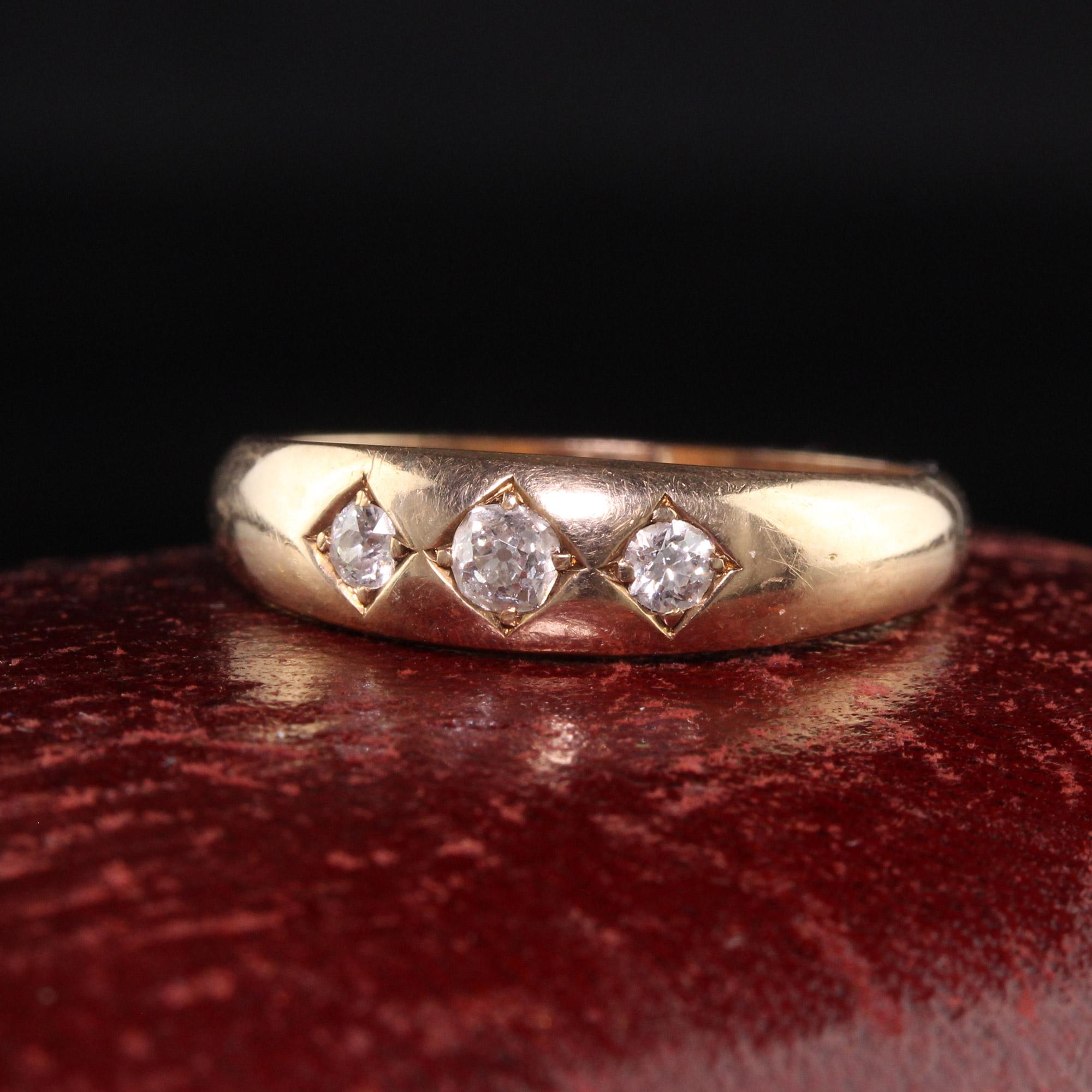 Beautiful Antique Victorian 14K Yellow Gold Old Mine Cut Diamond Three Stone Ring. This beautiful ring is crafted in 14k yellow gold. The ring has three old mine cut diamonds in the center and is in great condition.

Item #R1346

Metal: 14K Yellow