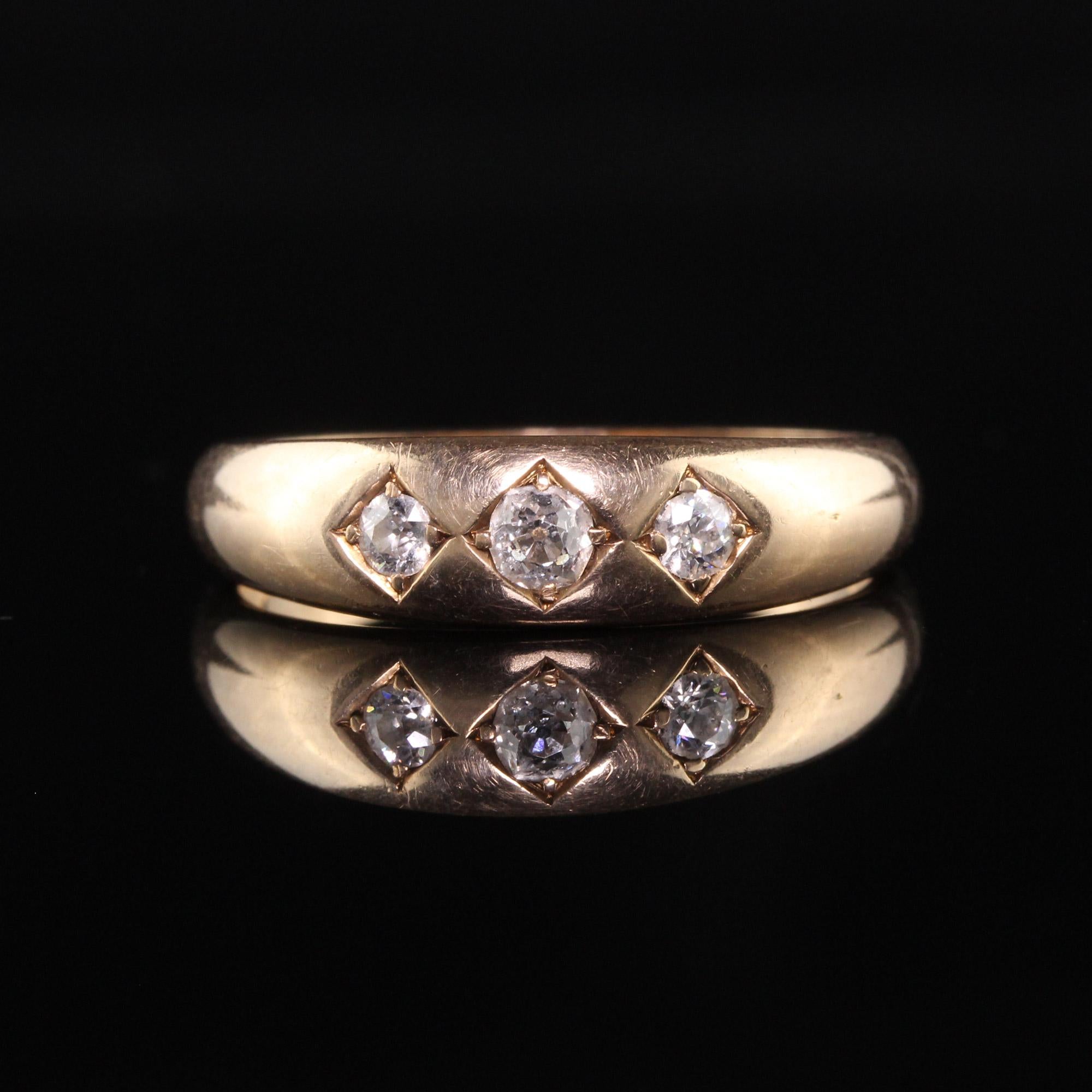 Women's or Men's Antique Victorian 14K Yellow Gold Old Mine Cut Diamond Three Stone Ring