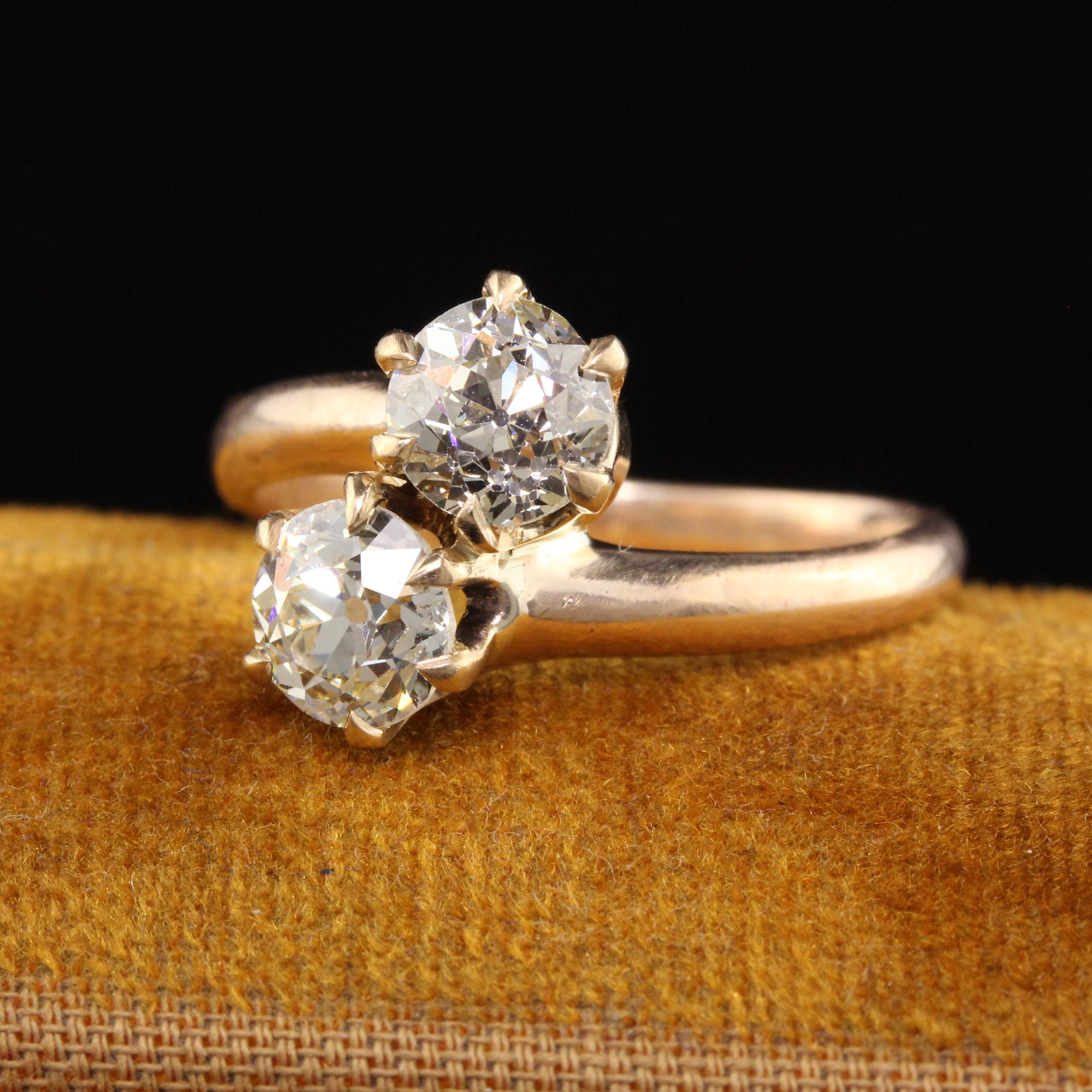 Beautiful Antique Victorian 14K Yellow Gold Old Mine Cut Diamond Toi et Moi Ring. This classic ring has two beautiful old mine cut diamonds set in yellow gold. The diamonds are very bright and sparkly.

Item #R1100

Metal: 14K Yellow Gold

Weight: