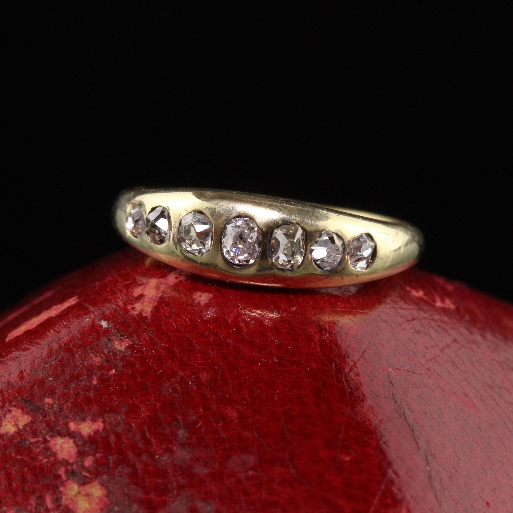 Beautiful Antique Victorian 14K Yellow Gold Old Mine Diamond Gypsy Ring. This incredible ring is crafted in 14k yellow gold. The top has chunky old mine cut diamonds gypsy set into the ring. It is in great condition.

Item #R1365

Metal: 14K Yellow