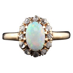 Antique Victorian 14 Karat Yellow Gold Opal and Rose Cut Diamond Cluster Ring