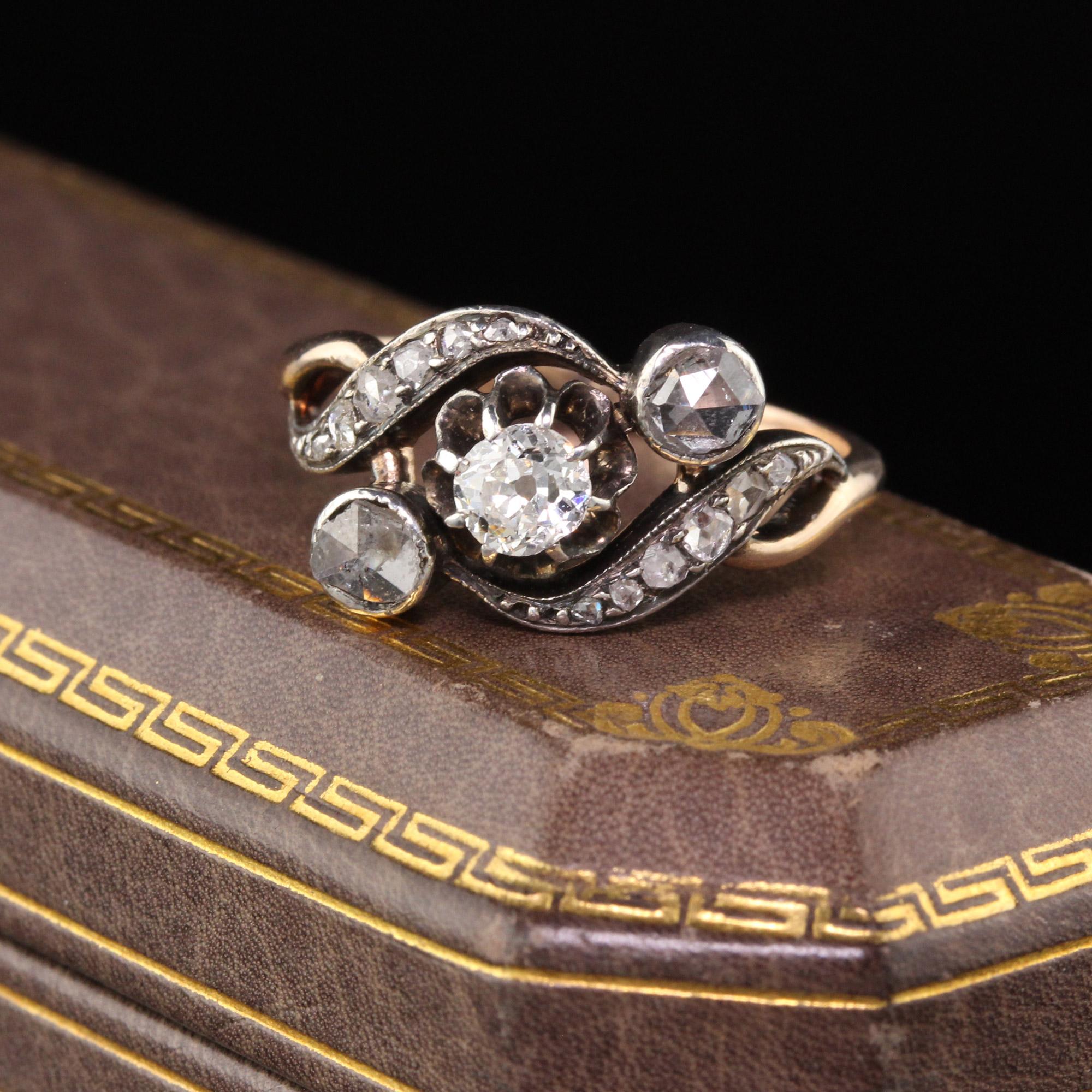 Gorgeous Victorian 3-stone engagement ring in 14K Yellow gold silver topped. The center stone is an old mine cut diamond and the other diamonds are rose cut. Wraps around the finger beautifully!

#R0395

Metal: 14K Yellow Gold & Silver Top

Weight: