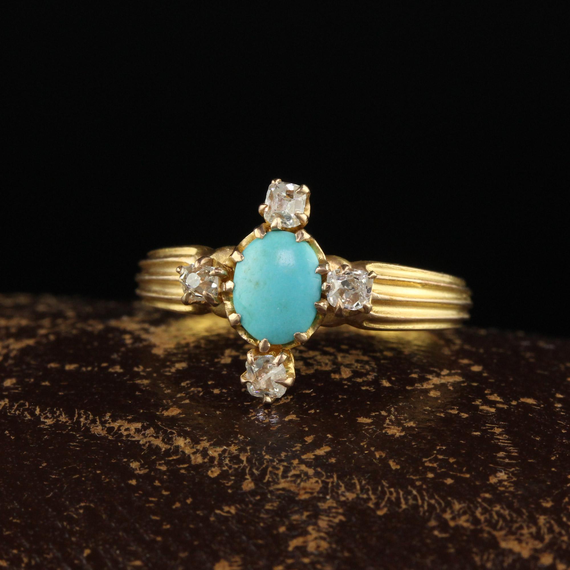 Beautiful Antique Victorian 14K Yellow Gold Turquoise and Diamond Engagement Ring. This gorgeous engagement ring is crafted in 14k yellow gold. The center holds a natural turquoise and has 4 old peruzzi cut diamonds that have very high crowns and