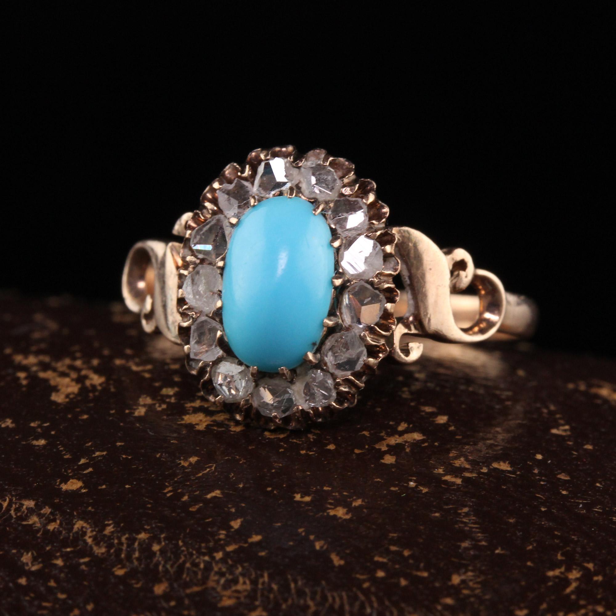 Beautiful Antique Victorian 14K Yellow Gold Turquoise and Rose Cut Diamond Engagement Ring. This ring is crafted in 14k yellow gold. The center is a cabochon turquoise and is surrounded by hand cut rose cut diamonds in a 14k yellow gold