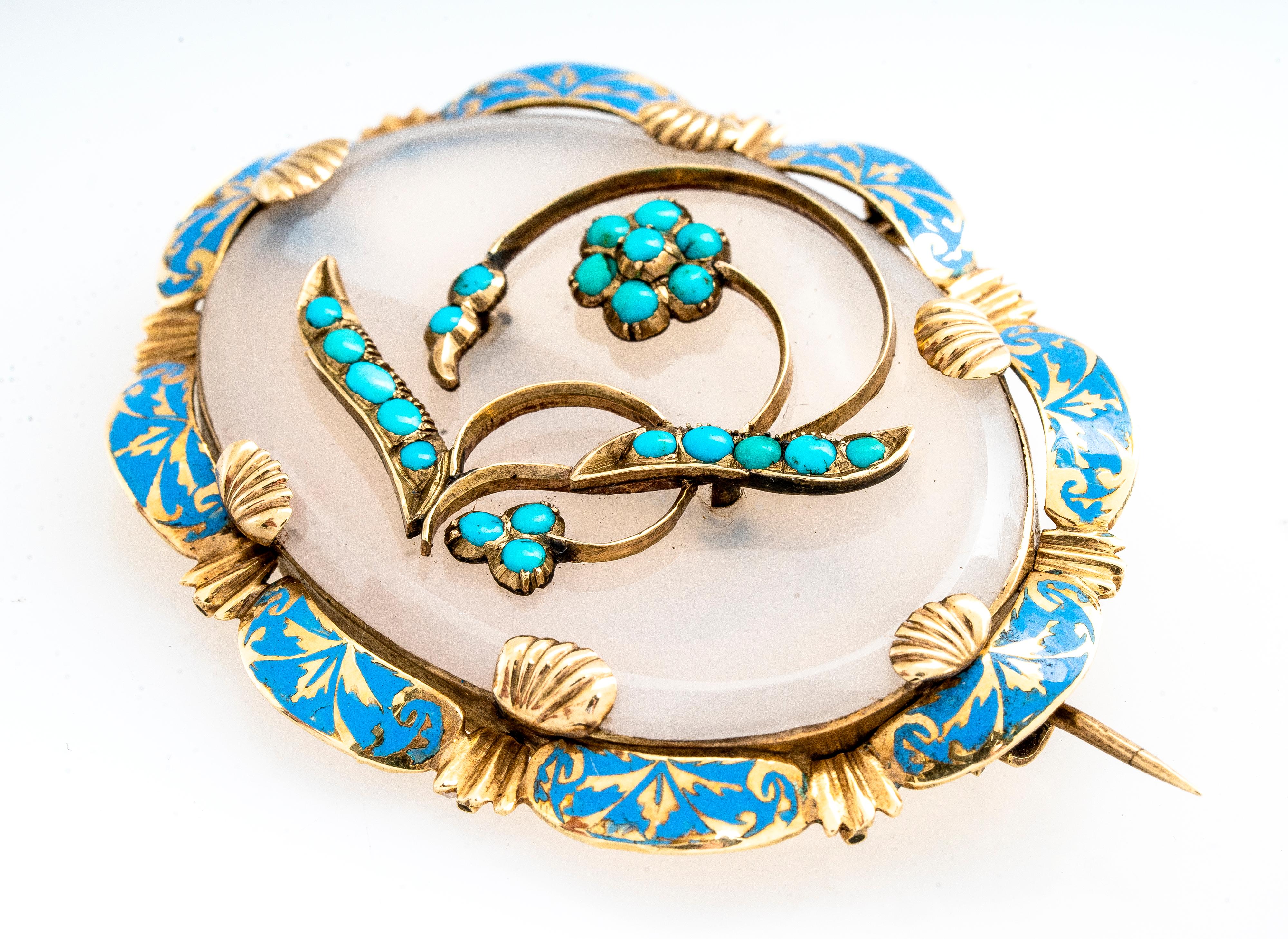 Antique Victorian 14ky gold  turquoise flower design and periwinkle blue enamel oval brooch and pendant.  The oval background of this brooch is chalcedony and is surrounded by a 14ky gold scalloped design with enamel detailing.  Enameling is in