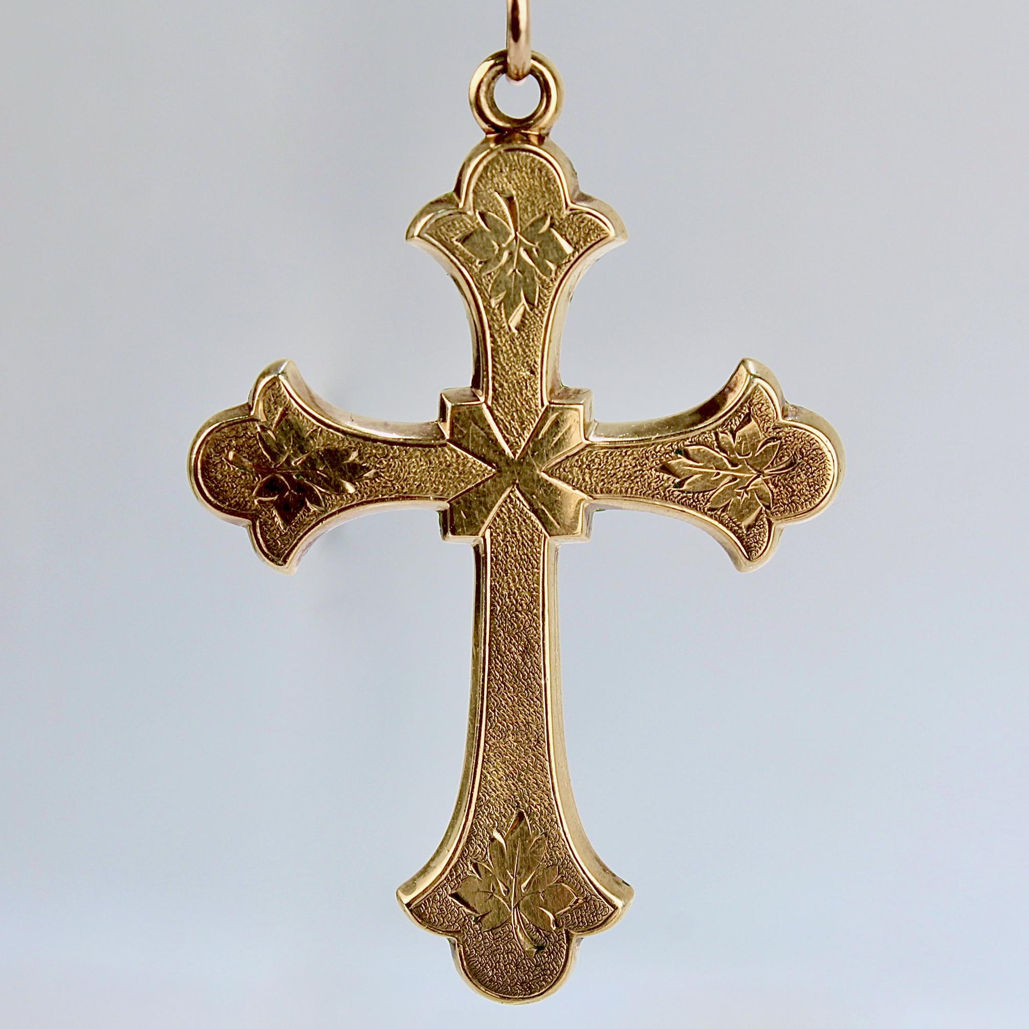 A very fine antique Victorian gold cross or crucifix.

With engraved and textured decoration on a hollow bodied cross.

Simply a beautiful antique cross pendant! 

Date:
19th Century

Overall Condition:
It is in overall good, as-pictured, used