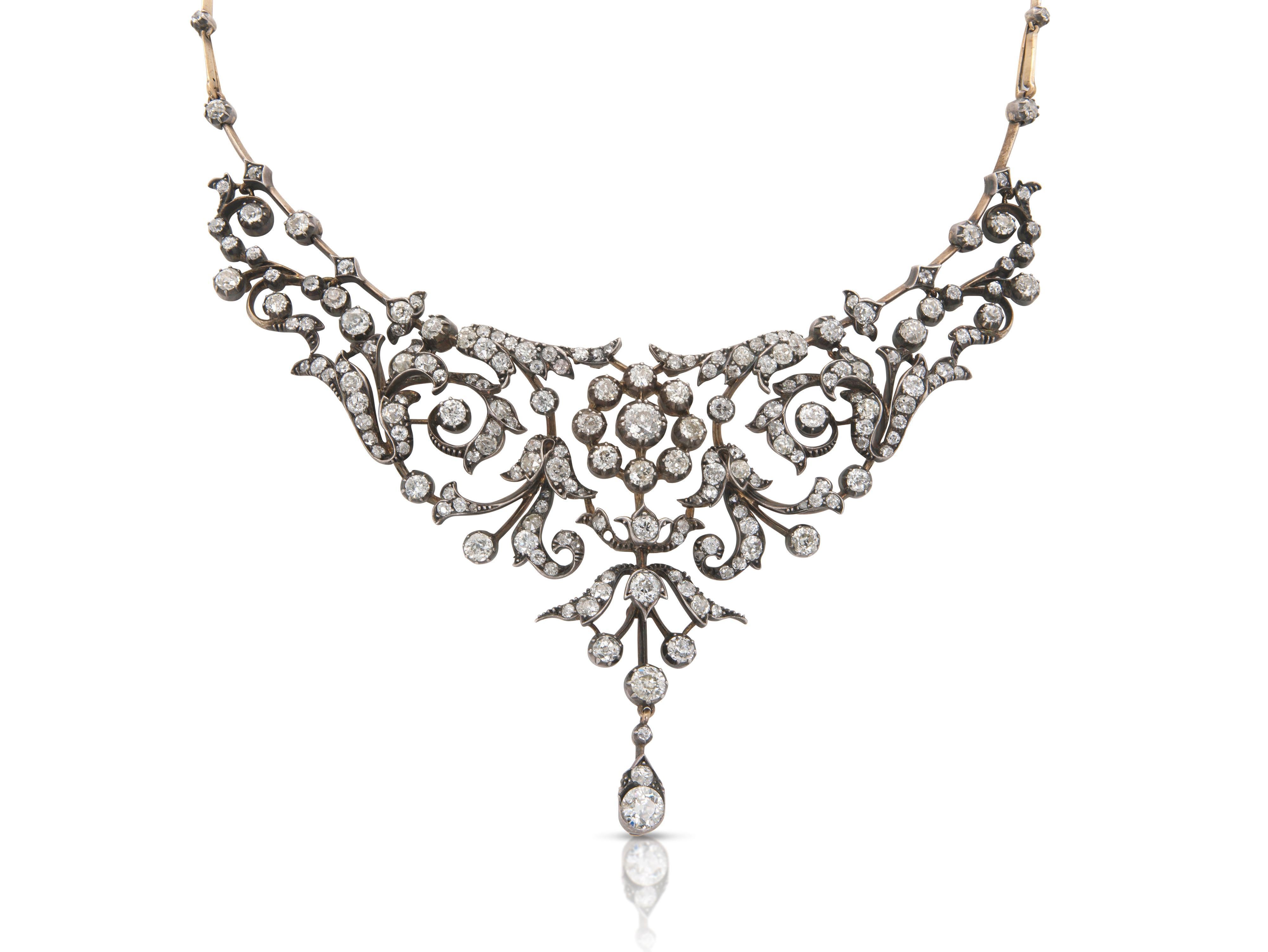 Finely crafted in silver over gold with Old European and Old Mine cut Diamonds weighing approximately a total of 15.00 carats.
Circa late 1800s
15 inches long