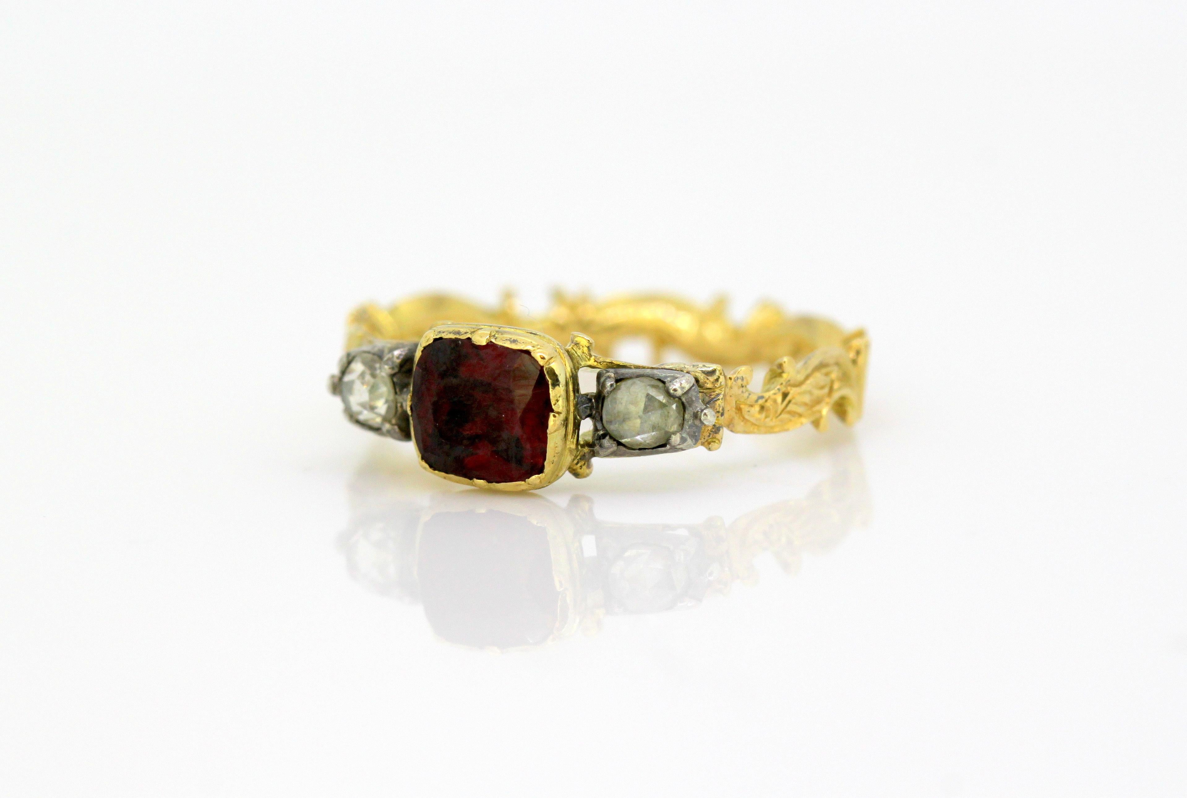 Antique Victorian 15k gold ring with ruby and diamonds
Made in England Circa 1860's
Tested positive for 15kt yellow gold.

Dimensions -
Finger Size: (UK) = M (US) = 6 1/2 (EU) = 52 1/2
Size : 2.3 x 2.2 x 0.6 cm
Weight: 3 grams total

Diamonds -
