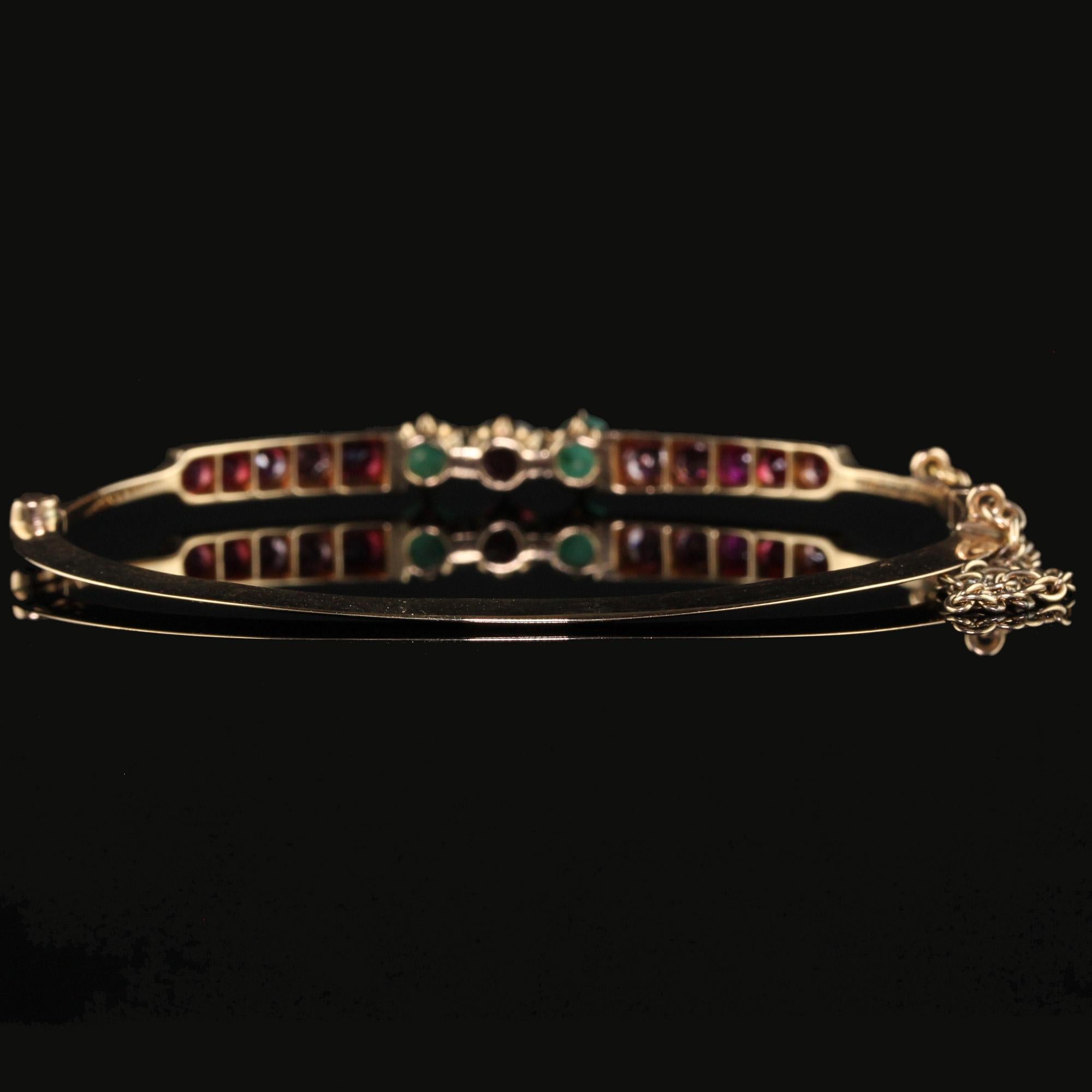 Antique Victorian 15K Yellow Gold Garnet and Emerald Bangle Bracelet 2