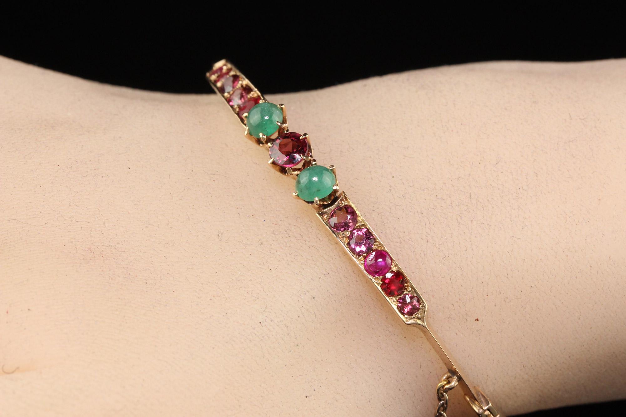 Antique Victorian 15K Yellow Gold Garnet and Emerald Bangle Bracelet 3