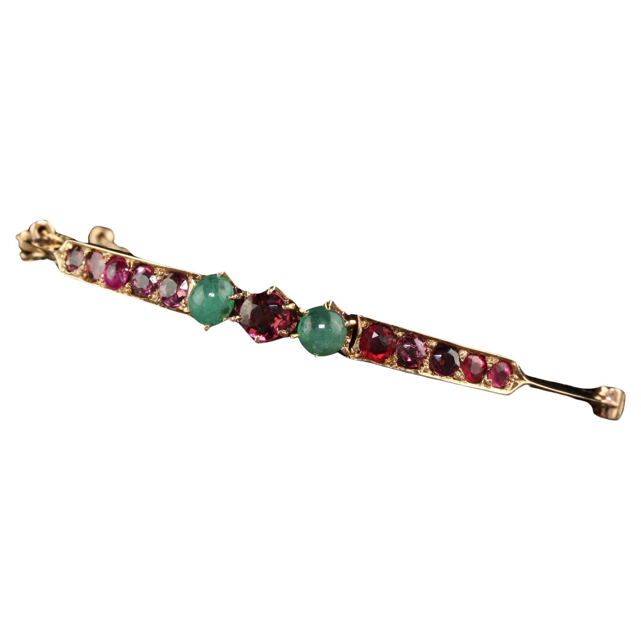 Antique Victorian 15K Yellow Gold Garnet and Emerald Bangle Bracelet