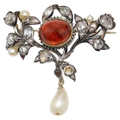 Antique Victorian 15kt. Yellow Gold and Sterling Silver Brooch with Garnet