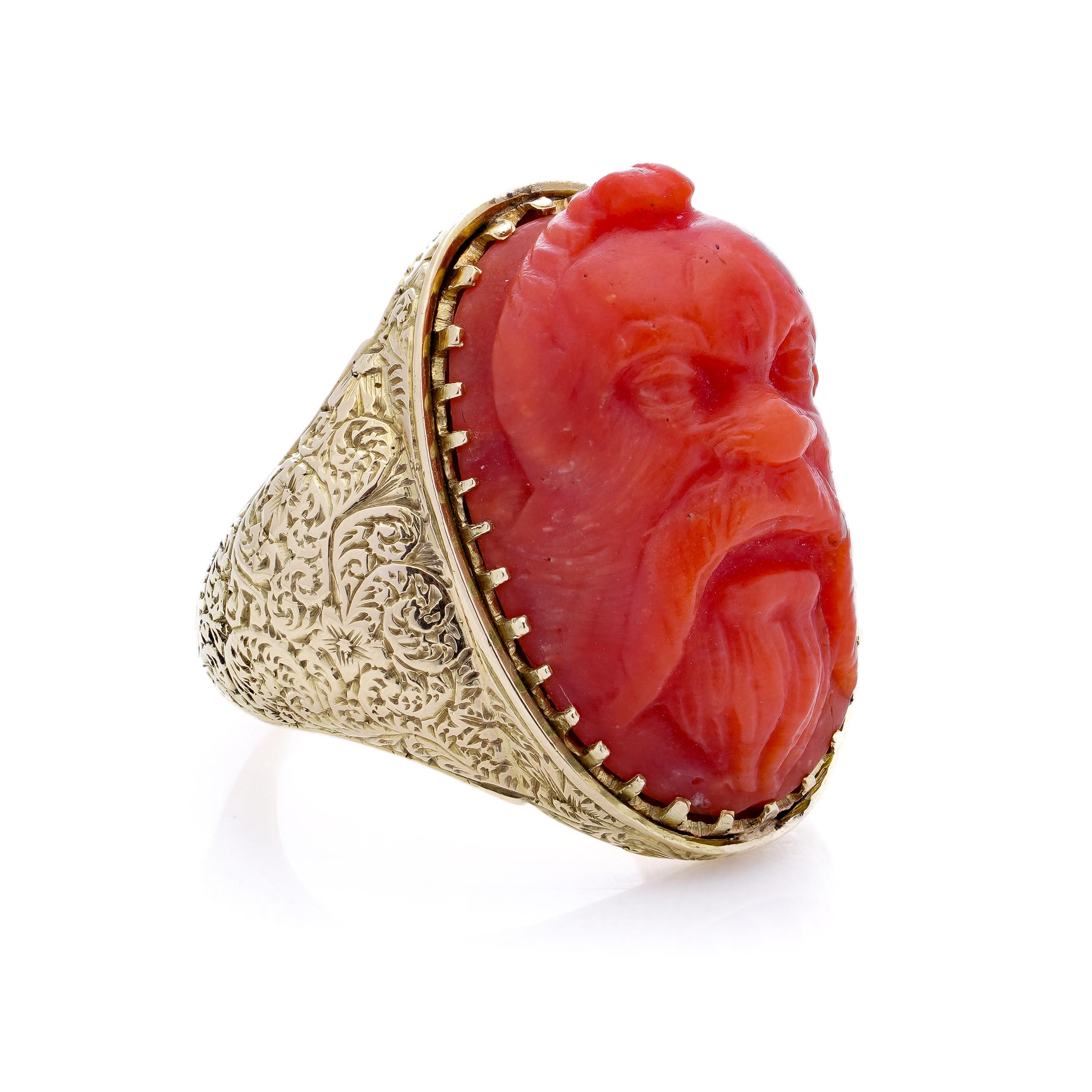 Antique Victorian 15kt. yellow gold coral ring, featuring a carved river God In Good Condition For Sale In Braintree, GB