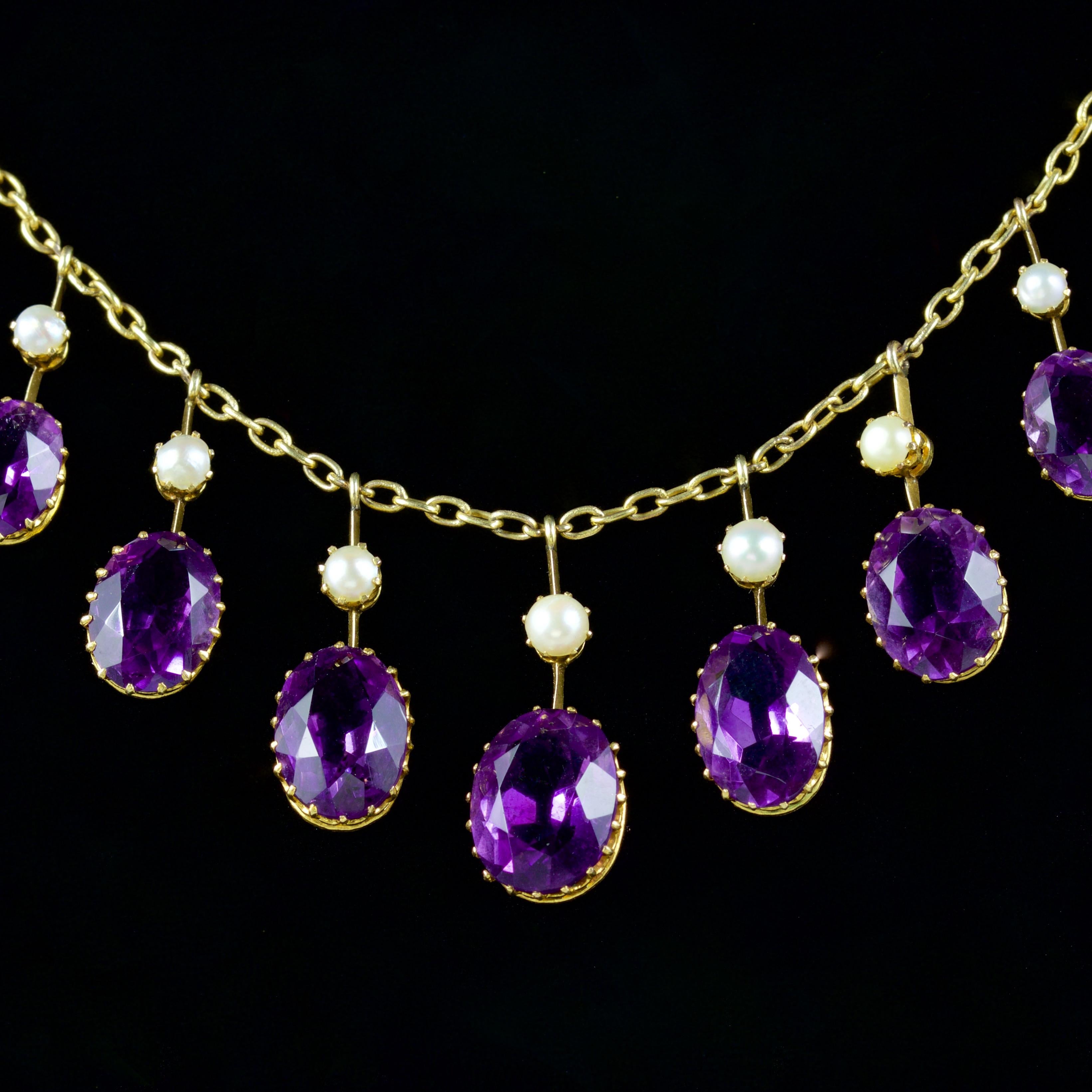 This spectacular Victorian 18ct Amethyst Pearl Garland necklace is, Circa 1880.

This breathtaking Amethyst and Pearl Garland necklace is set with Velvet Amethysts that are complimented by lovely lustrous seed Pearls.

The largest Amethyst is 3ct,