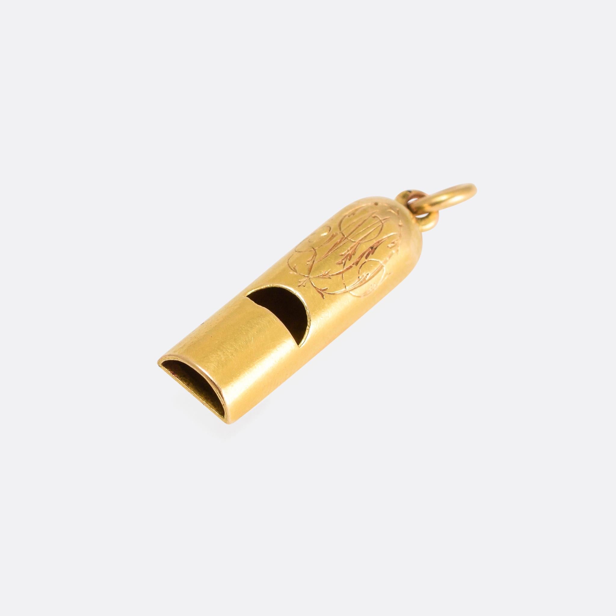 A fine antique whistle pendant, modelled in 18 karat gold. It was made in England in the late Victorian period, circa 1880, with a hand-chased monogram to the front (either DM or MD).

MEASUREMENTS 
31.5 x 8.4mm

WEIGHT 
3.3g

MARKS 
No marks