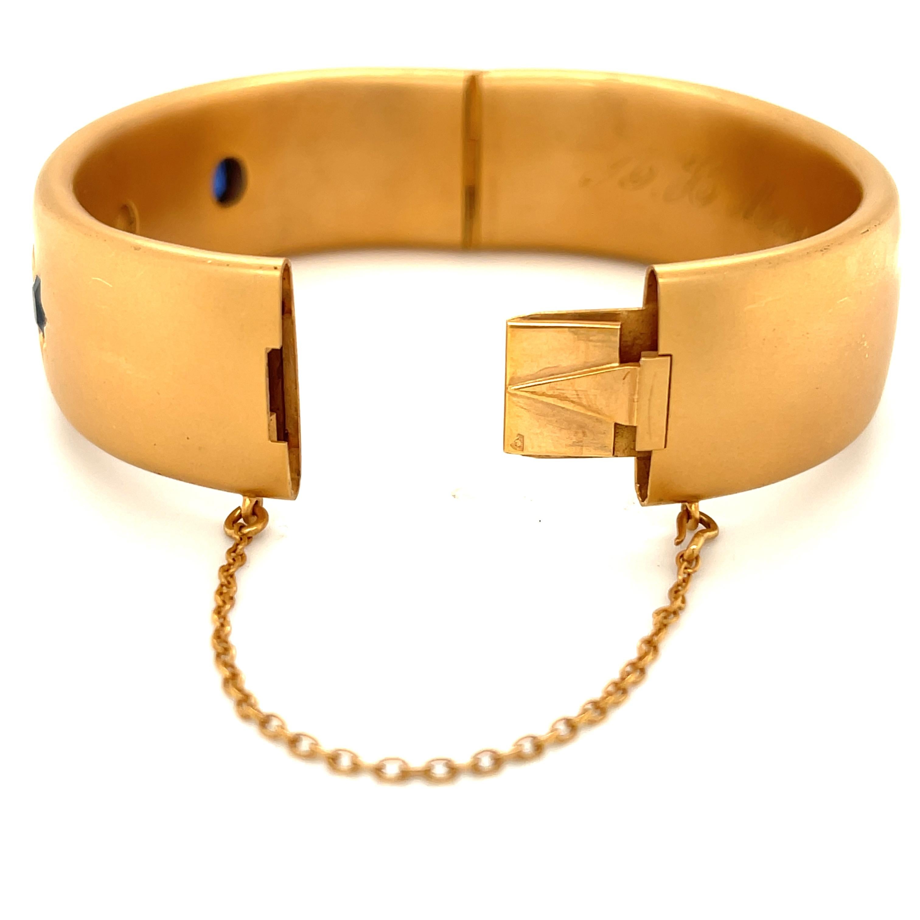 gold and sapphire bangle bracelet