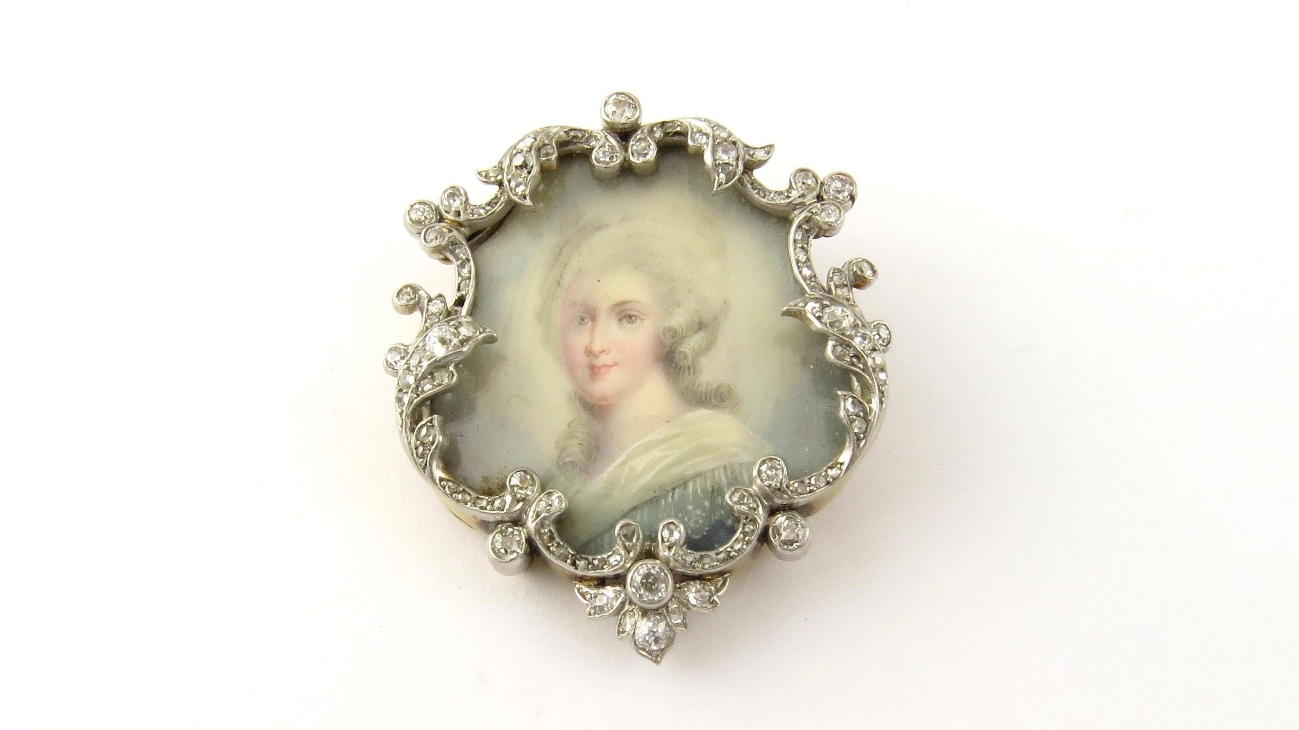 Antique Victorian 18 Karat Yellow Gold and Diamond Portrait Brooch/Pin-

This exquisite 18K gold brooch features a portrait of a lovely lady surrounded with a wreath frame decorated with 92 old mine and rose cut diamonds set in silver, as was