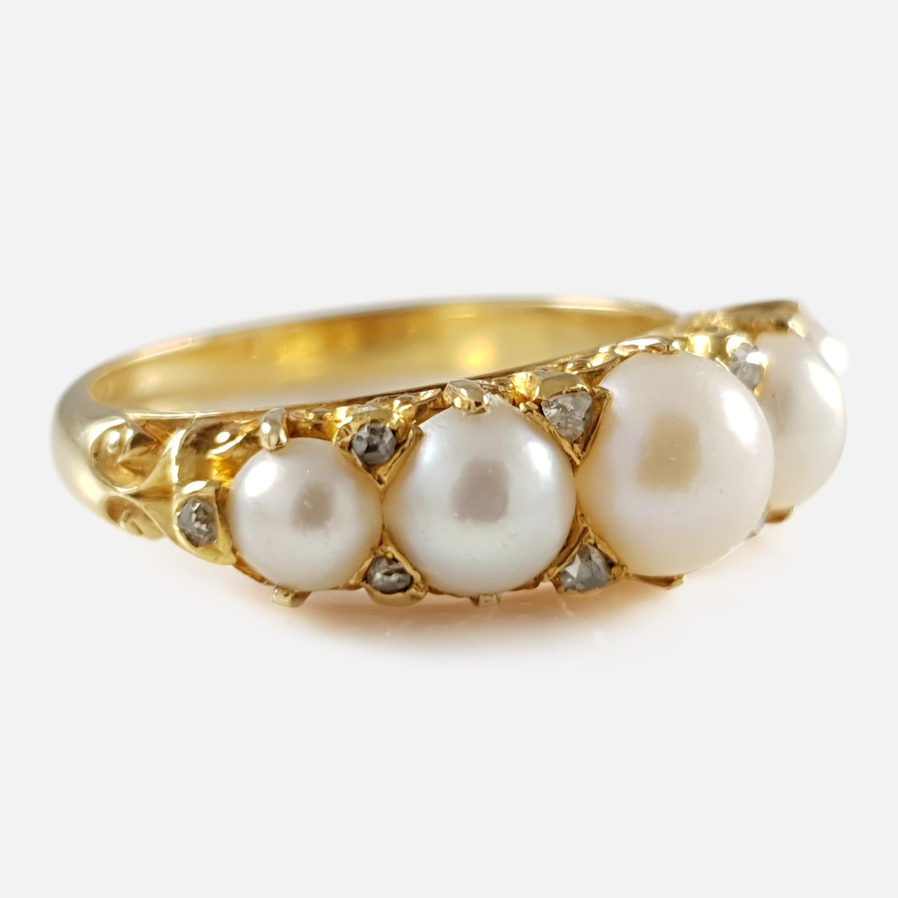 Description: - A fine Victorian 18 karat yellow gold pearl & diamond ring. The scroll engraved ring is set with 5 pearls, and a further 10 rose cut diamonds. As was common for the period the ring is unhallmarked, and has been tested, and confirmed