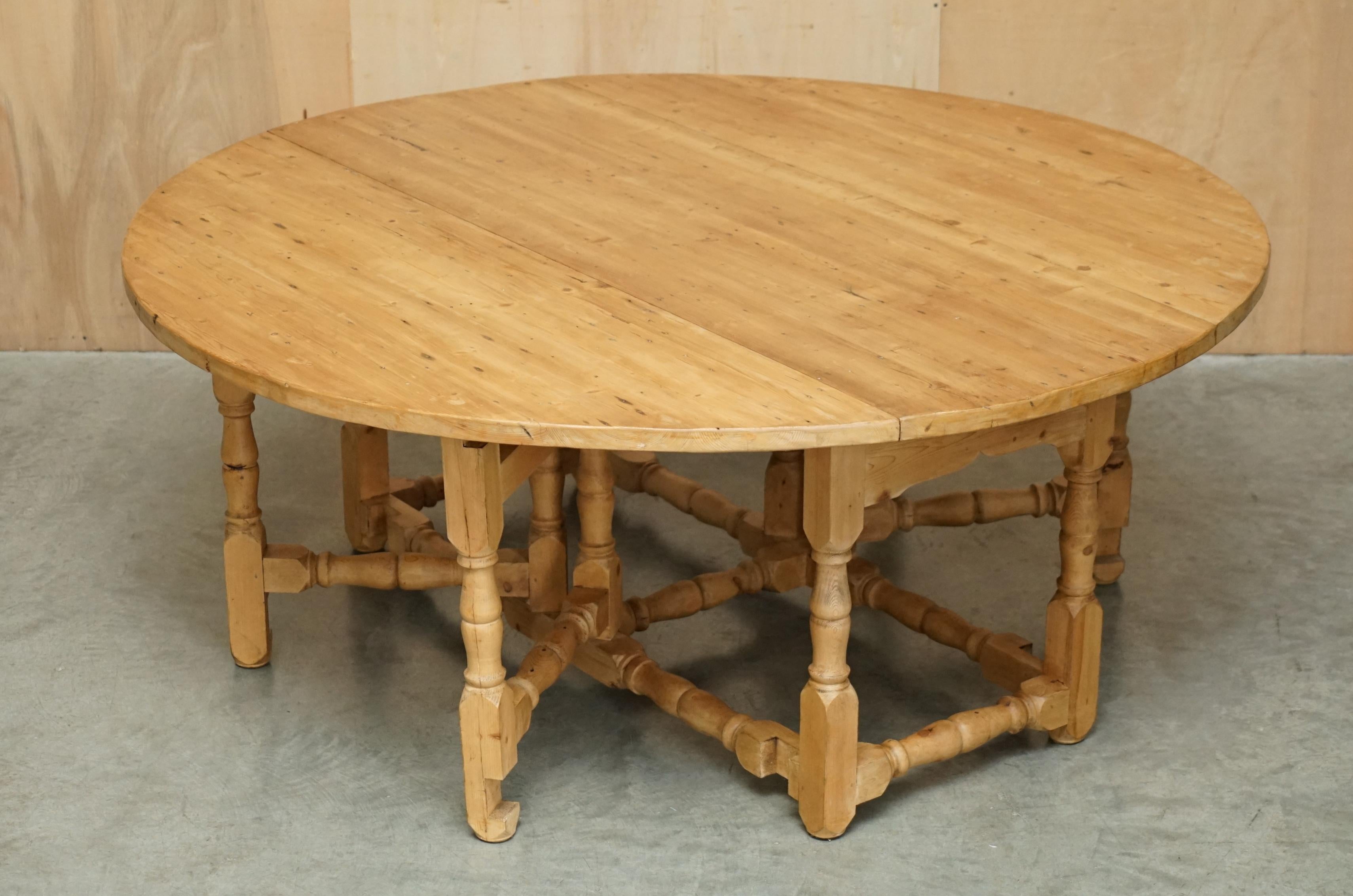Hand-Crafted ANTIQUE VICTORIAN 183CM WIDE BURR PINE GATELEG EXTENDING ROUND DiNING TABLE For Sale
