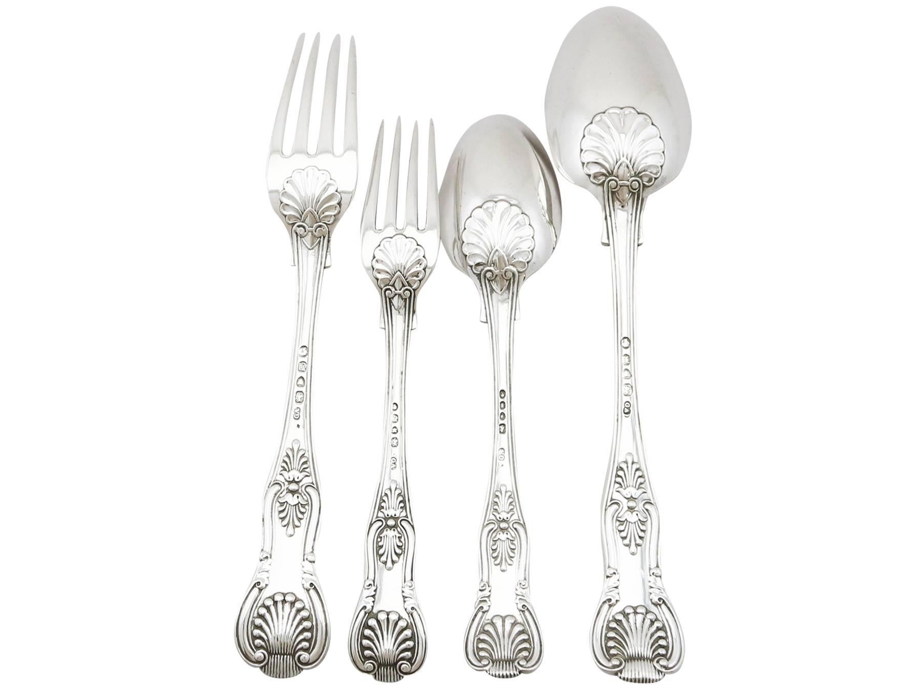 An exceptional, fine and impressive antique Victorian English straight sterling silver King's pattern flatware service for 12 persons; an addition to our canteen of cutlery collection.

The pieces of this fine, antique Victorian sterling silver