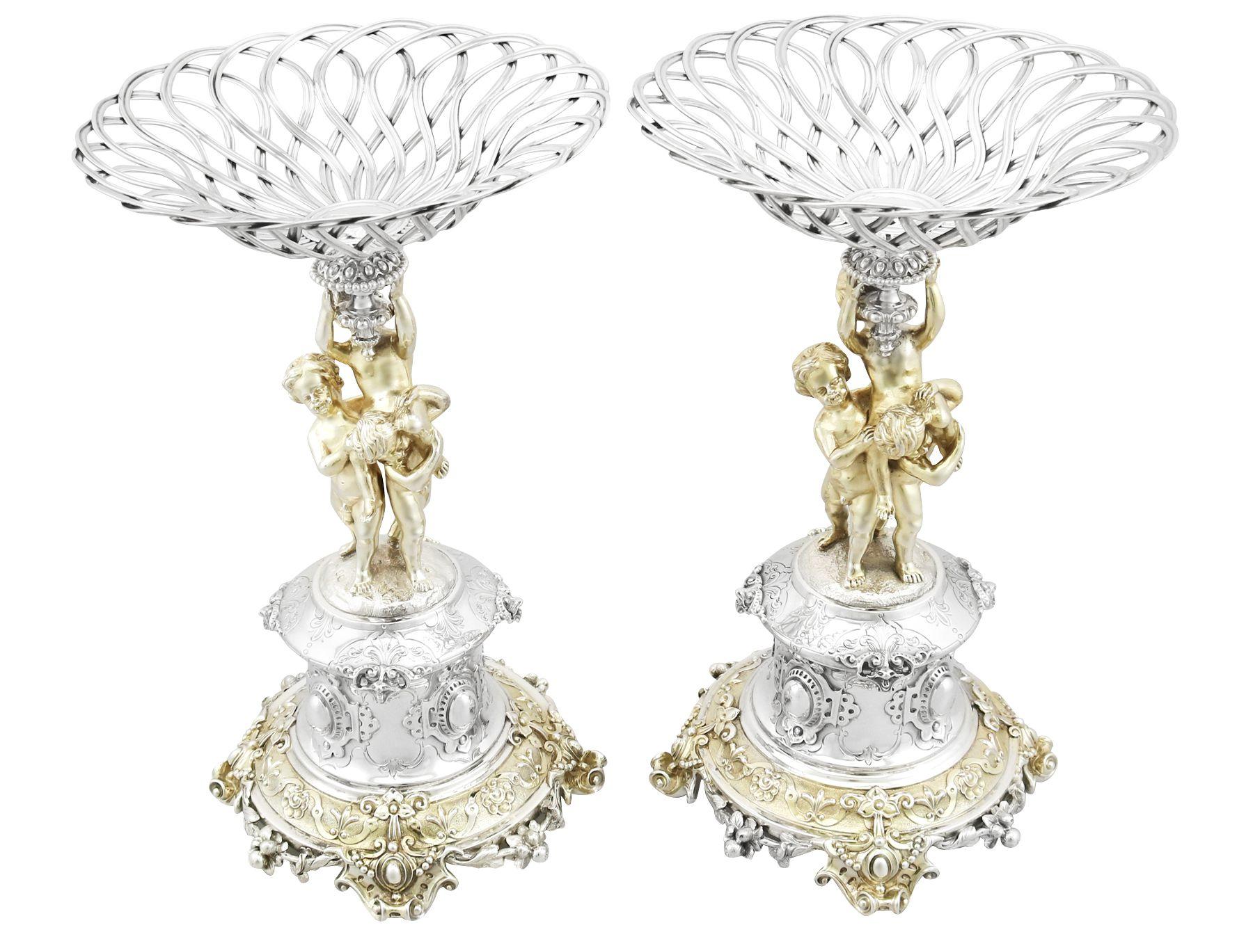 A magnificent, fine and impressive, pair of antique Victorian English sterling silver tazzas/centrepieces; an addition to our continental silverware collection.

These magnificent antique Victorian sterling silver tazzas or centrepieces have a